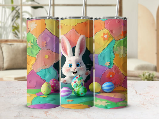 Three Easter-themed tumblers with a cartoon bunny and painted eggs.