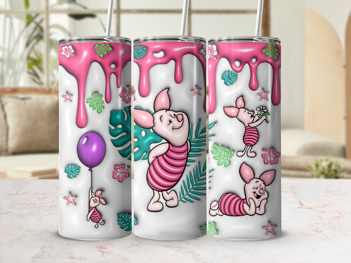 Winnie the Pooh character Piglet designs on three white tumblers with pink drips.