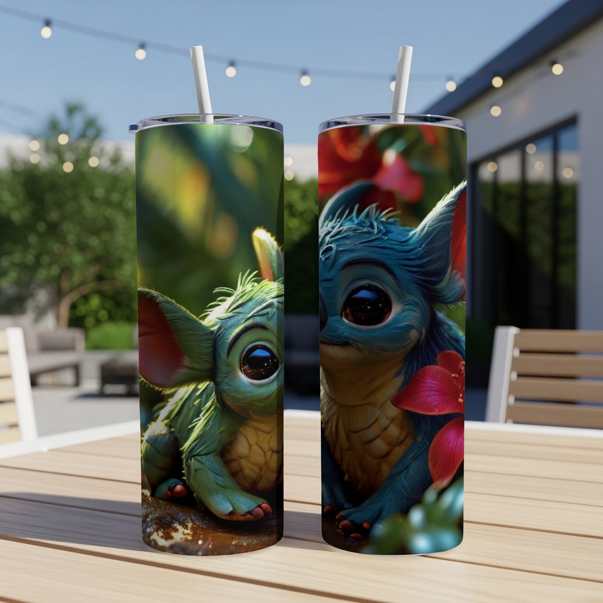 Two tumblers featuring a green, alien-like creature with large eyes and red flowers.