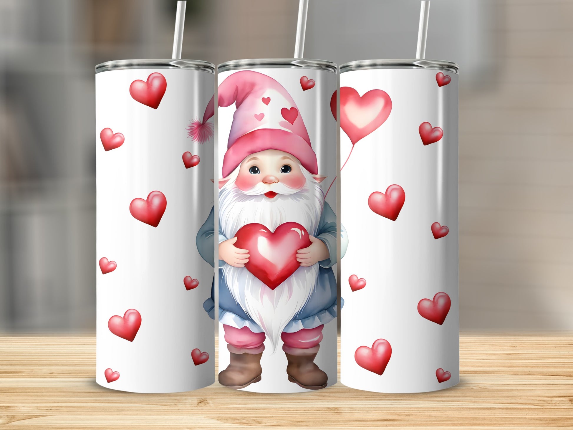 Three tumblers with a gnome holding a heart, surrounded by hearts.