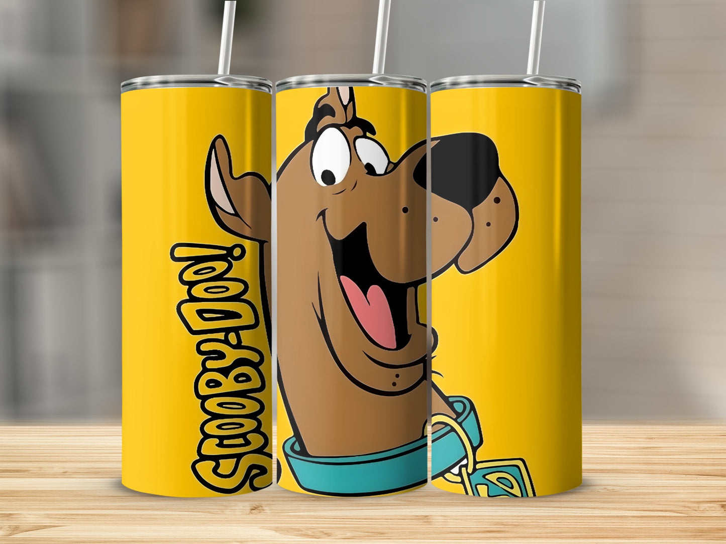 Scooby-Doo character and logo on yellow tumbler.