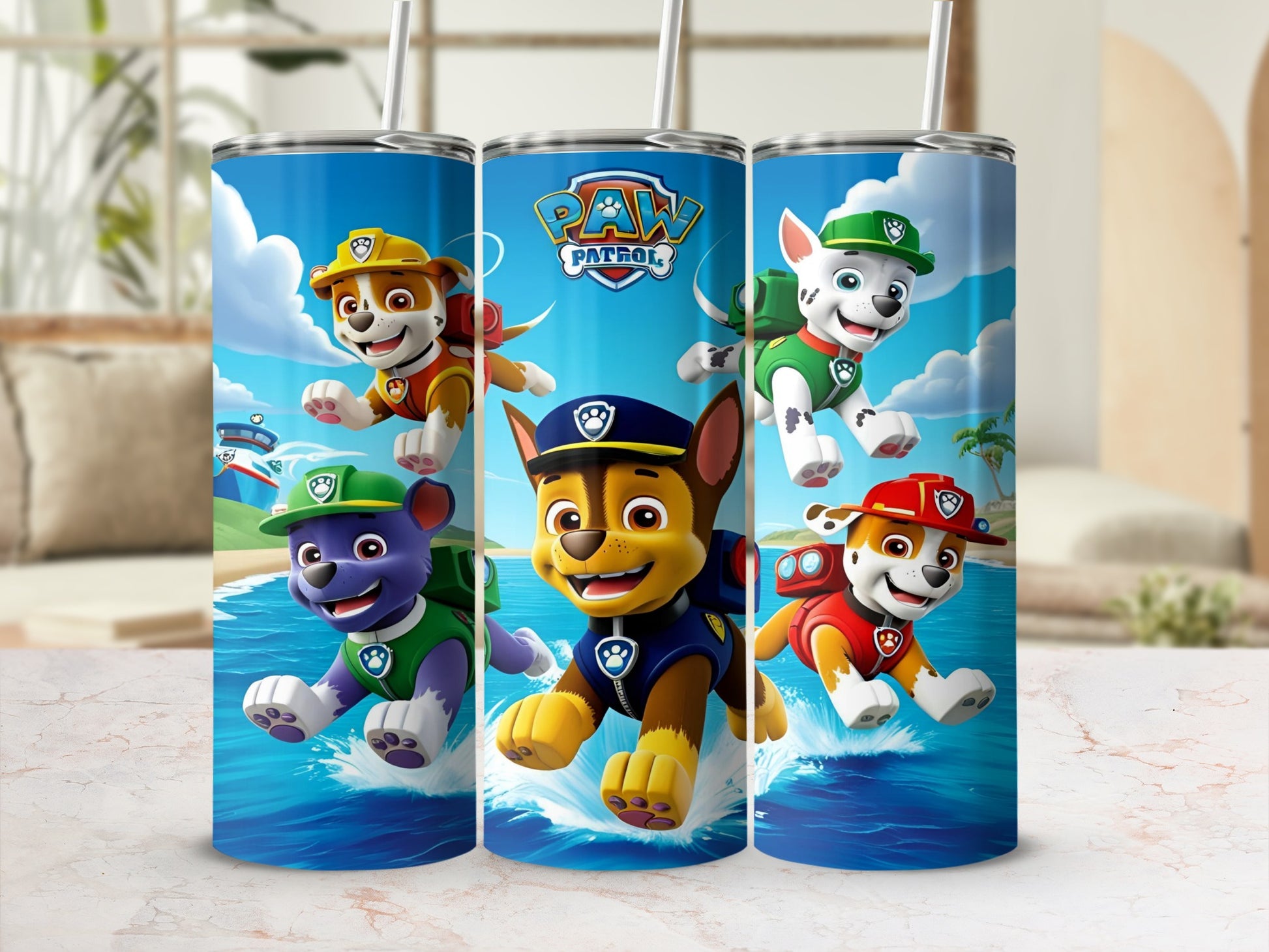Paw Patrol characters Chase, Marshall, Rubble, and Skye on a blue tumbler.
