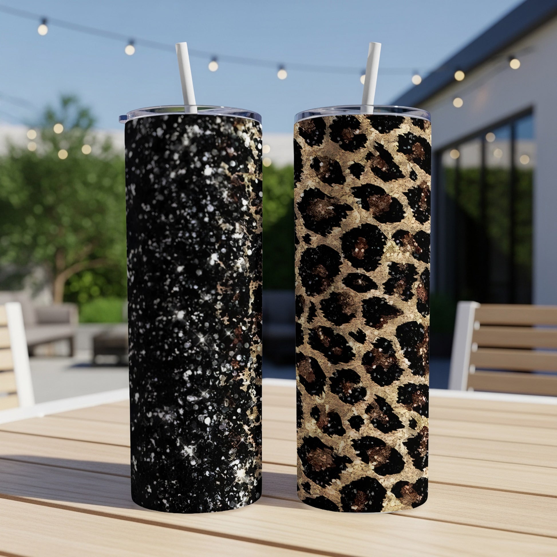 Two tumblers, one with black glitter, the other with leopard print.