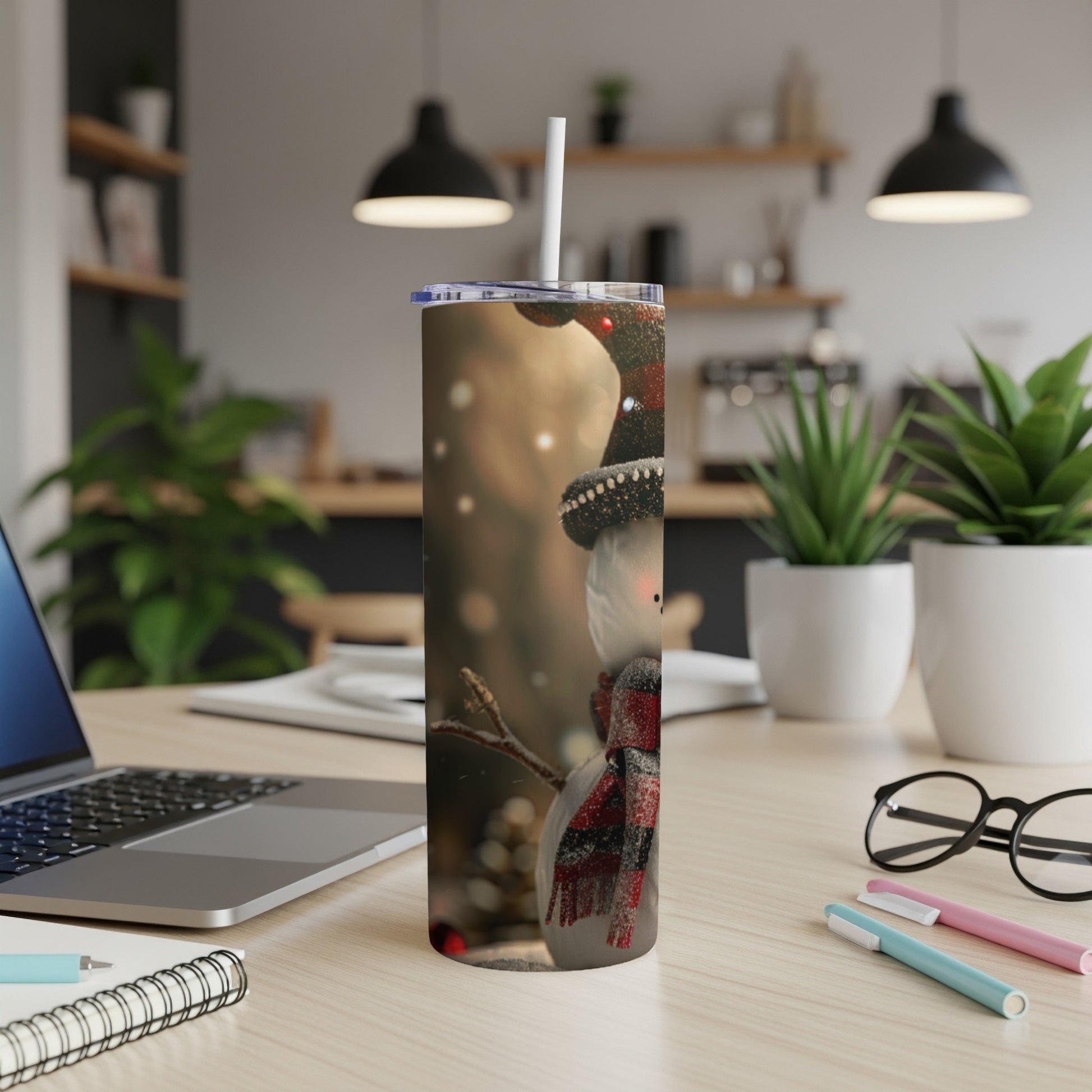 Tall tumbler with snowman design, red plaid scarf, black hat, and straw.