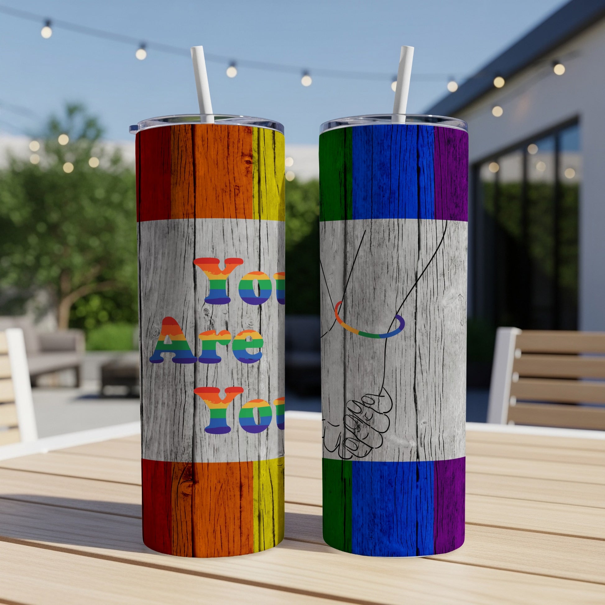 Two tumblers with rainbow flag design and text "You Are You".