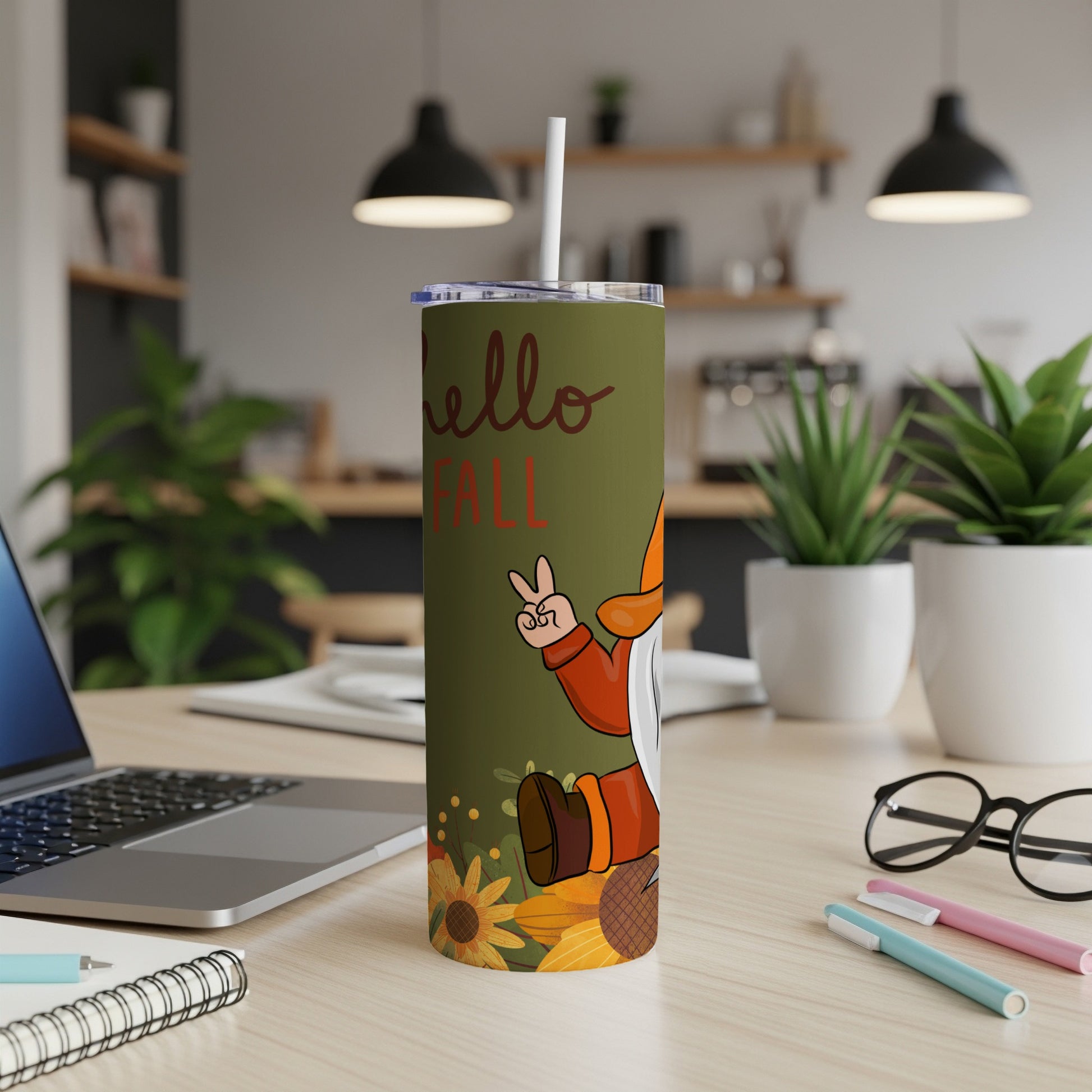 Green tumbler with gnome, sunflowers, and "Hello Fall" text.