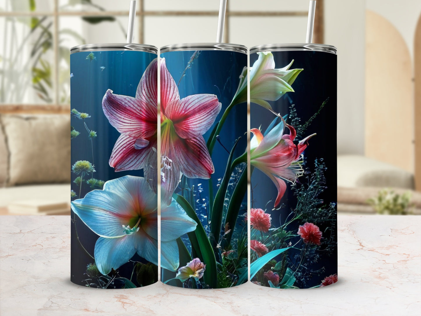 Three tumblers with underwater flowers and aquatic plant designs.