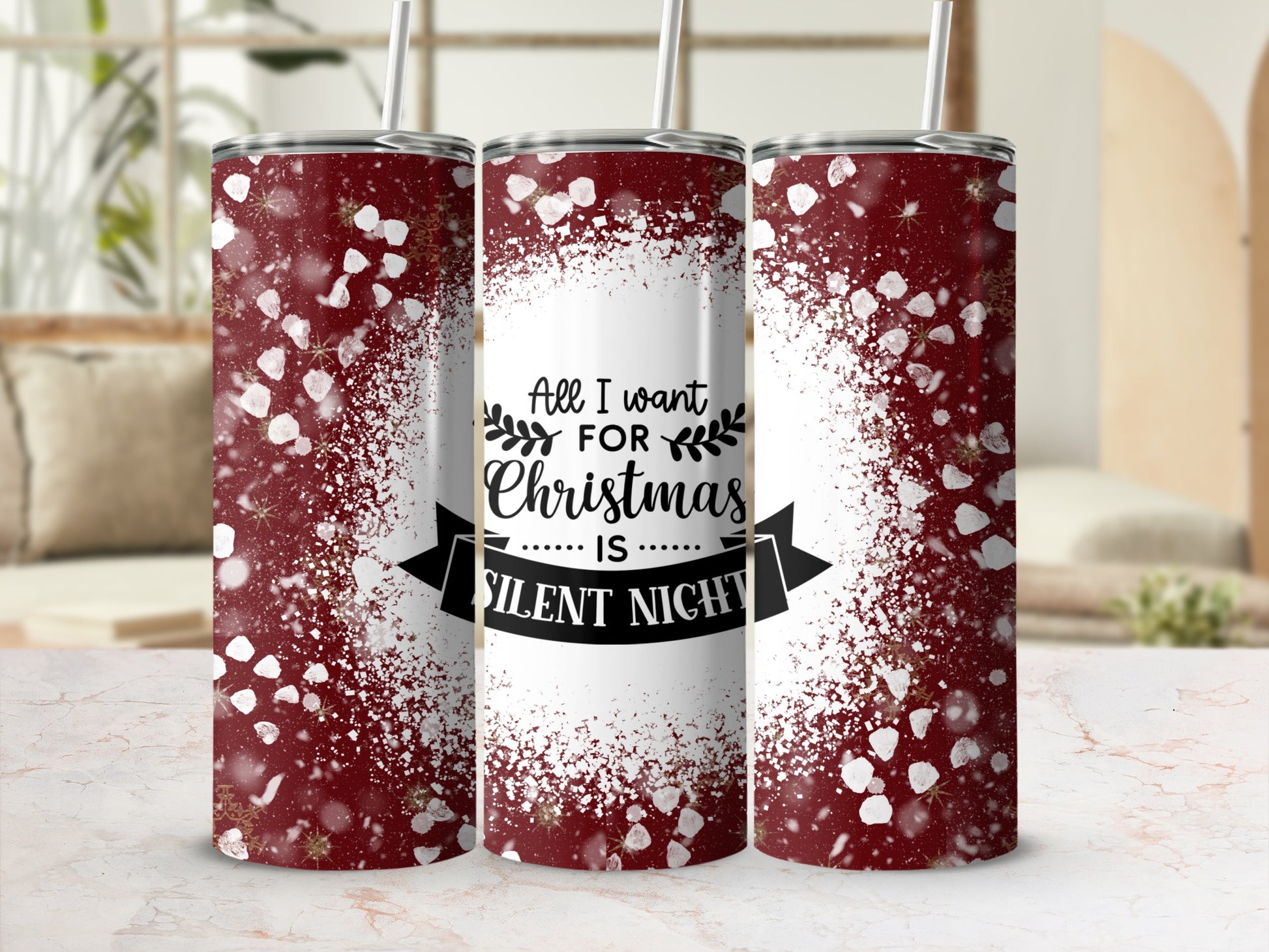 Maroon tumbler with white snow and "All I want for Christmas is Silent Night" text.