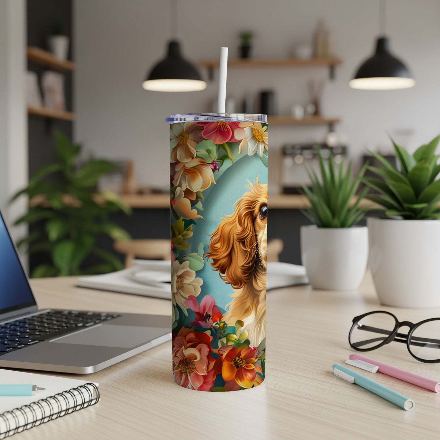 Cavalier King Charles Spaniel with floral pattern on a travel tumbler.