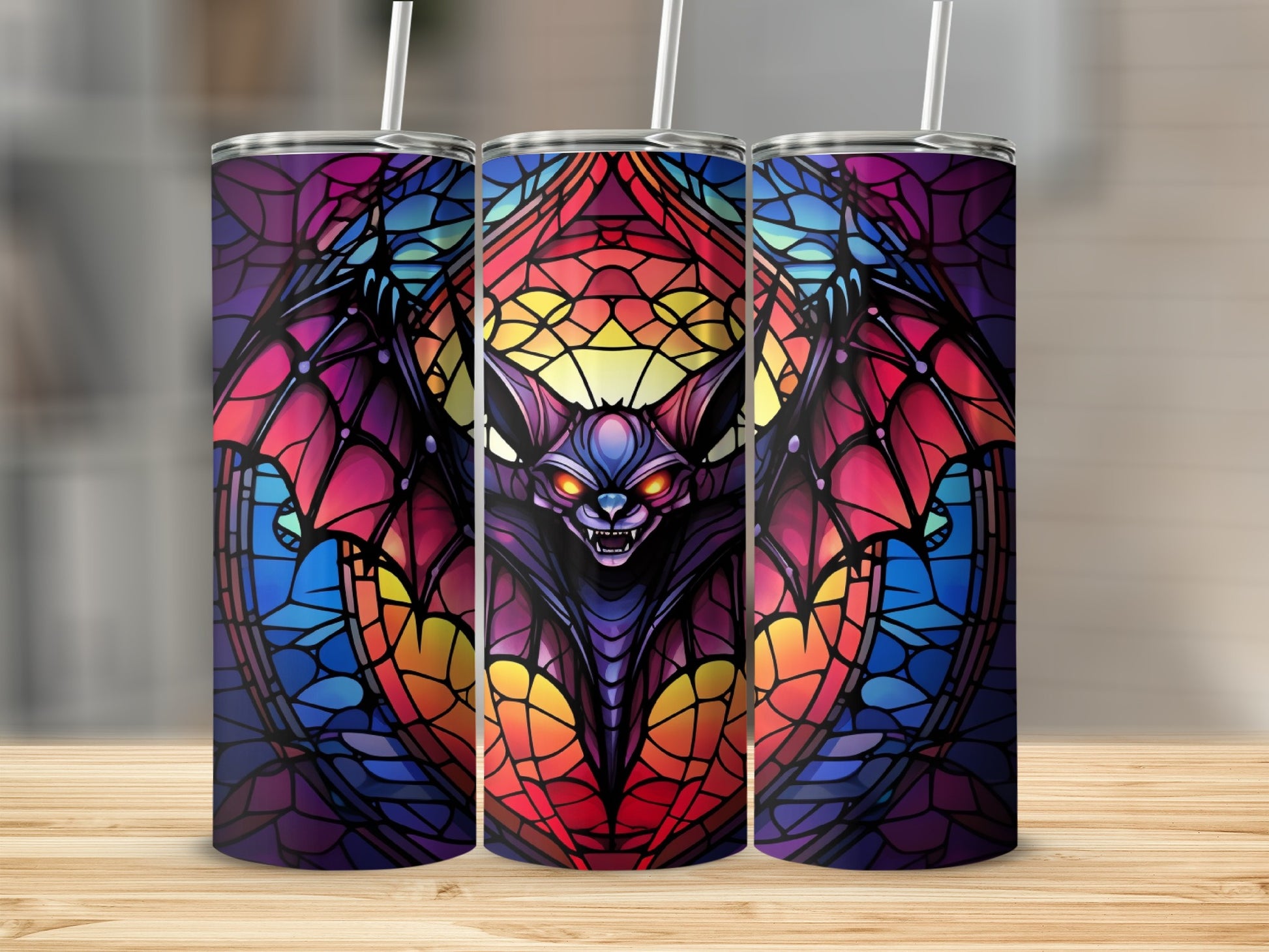 Stained glass tumbler with a vampire bat design.