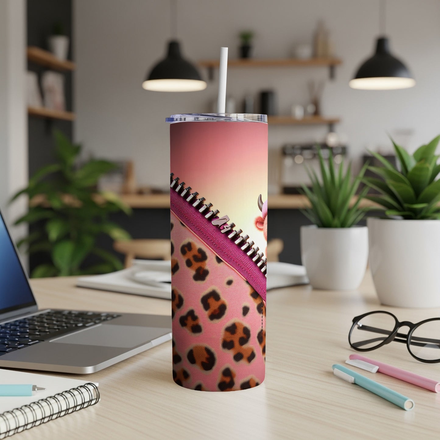 Pink ombre tumbler with leopard print and zipper design.