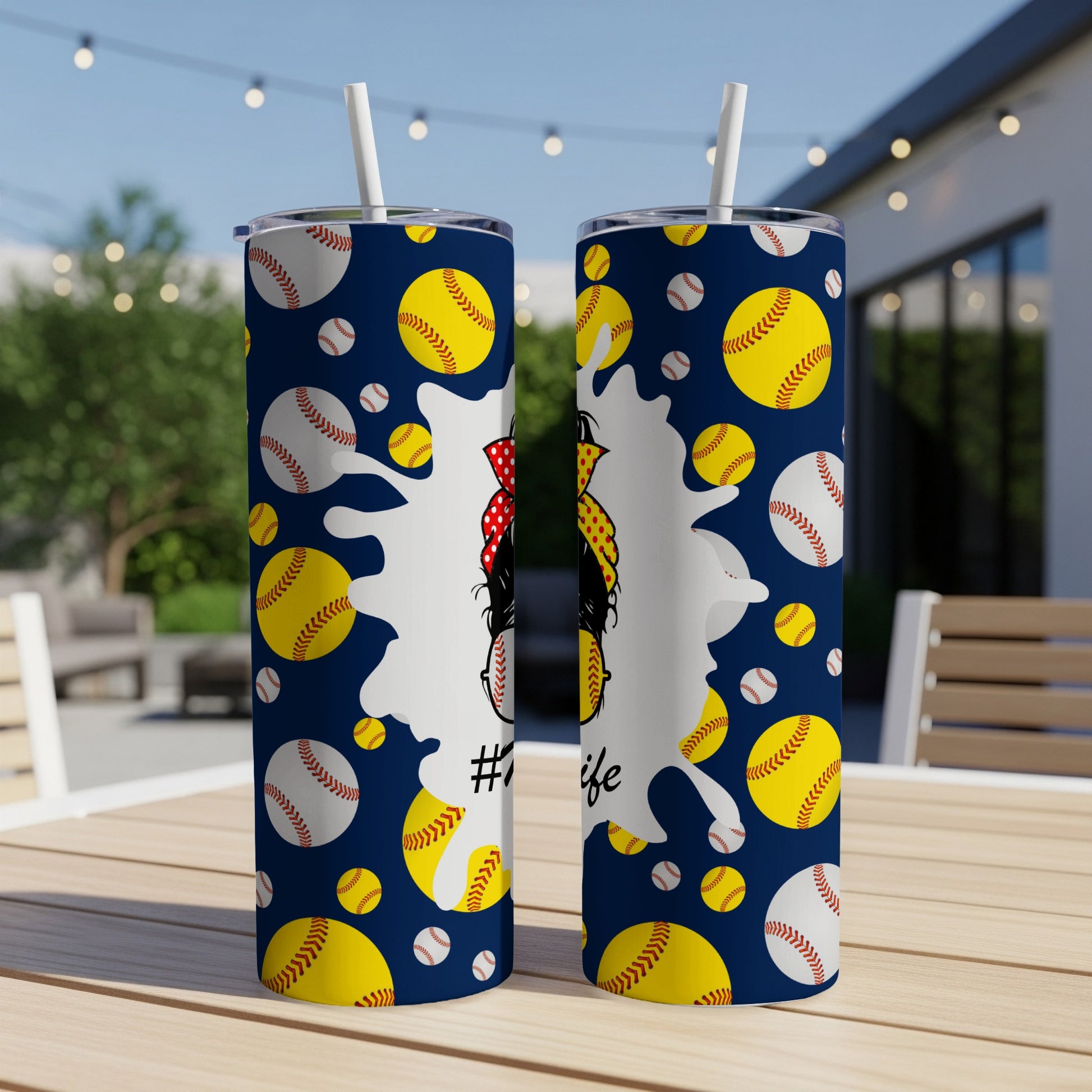 Navy blue tumbler with softball pattern and "#softballlife" text.