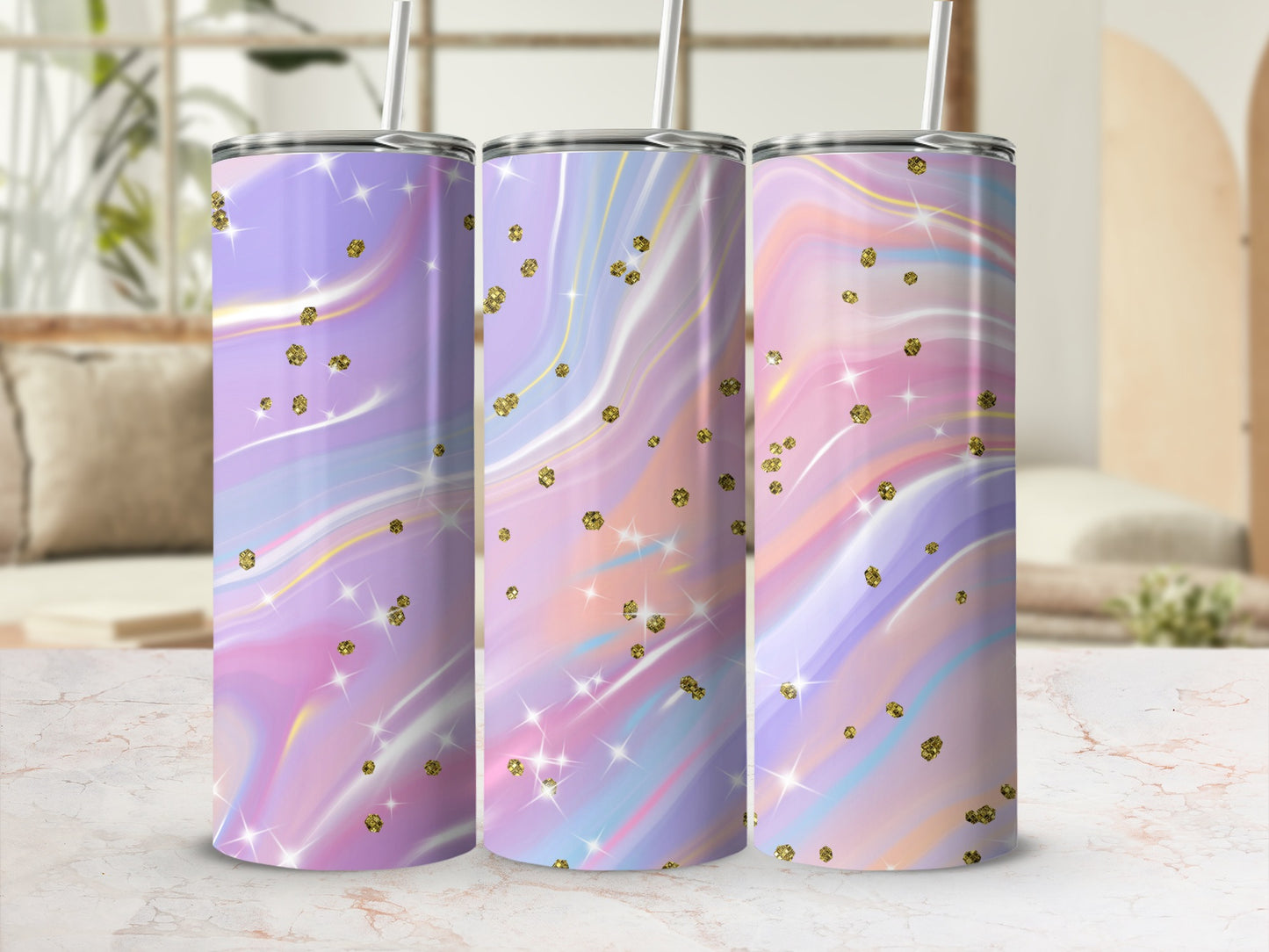 Three tumblers with pastel marble swirls and gold glitter accents.