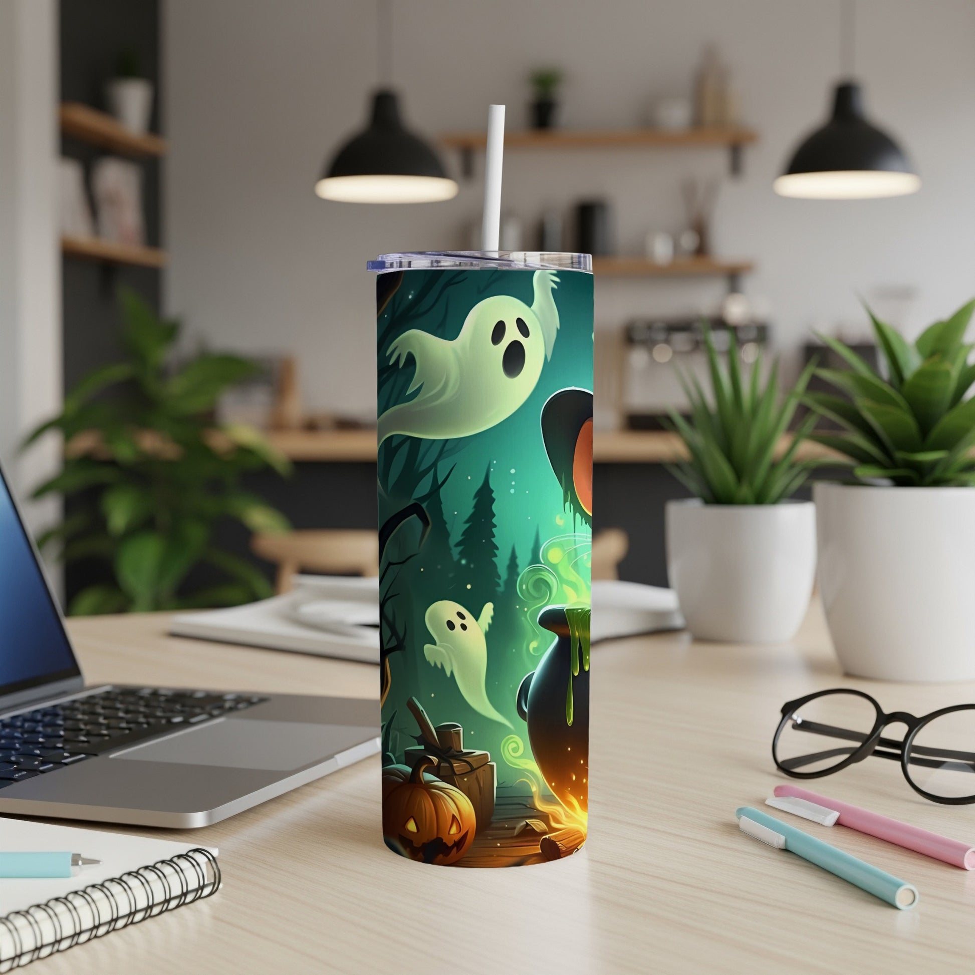 Tumbler with Halloween ghosts, pumpkin, cauldron, and witch hat design.