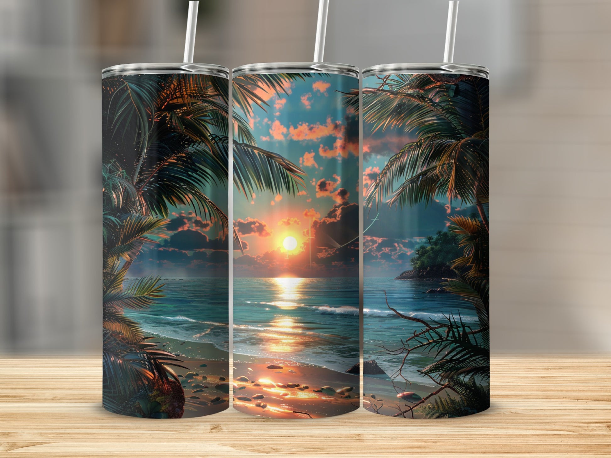 Three tumblers with a sunset beach scene and palm trees.