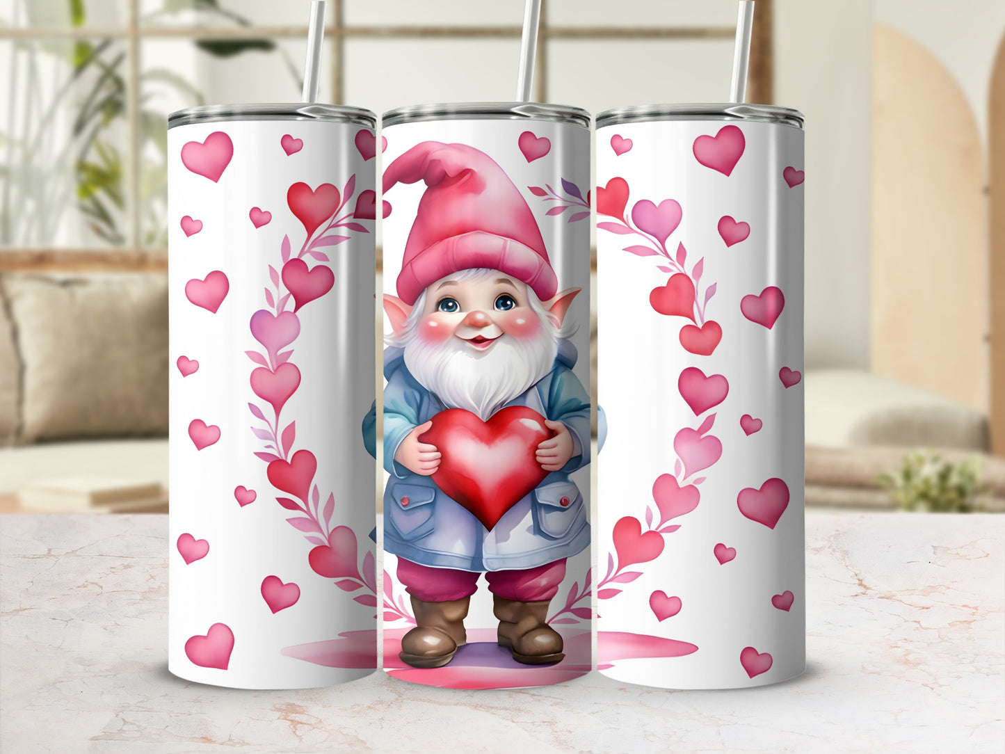 Pink hearts surround a smiling gnome holding a red heart on a white tumbler.