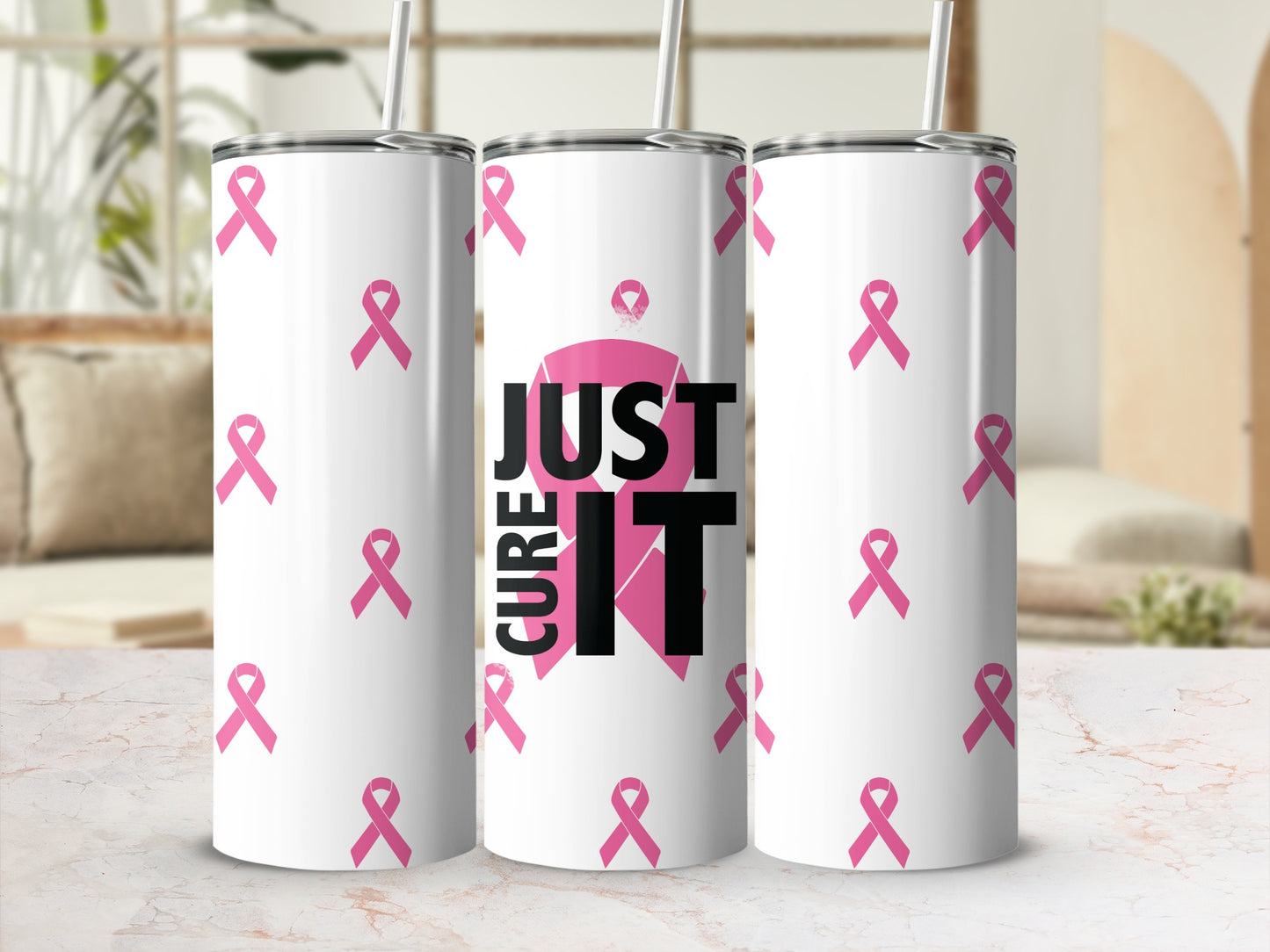 White tumbler with repeating pink breast cancer ribbons and "JUST CURE IT" text.