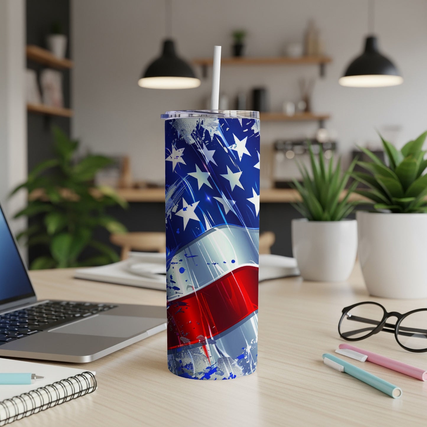American flag pattern on a stainless steel tumbler with straw.