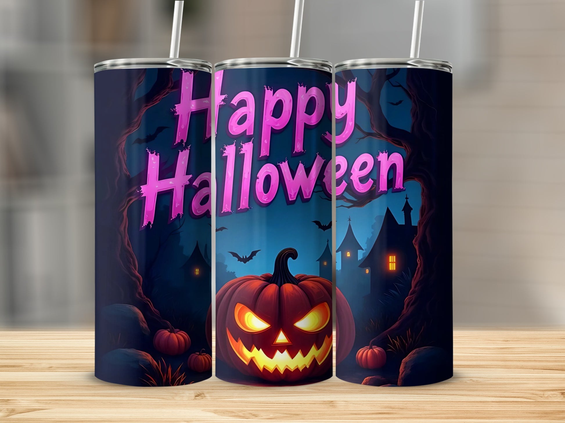 Halloween tumbler with jack-o'-lantern, haunted houses, and bats.
