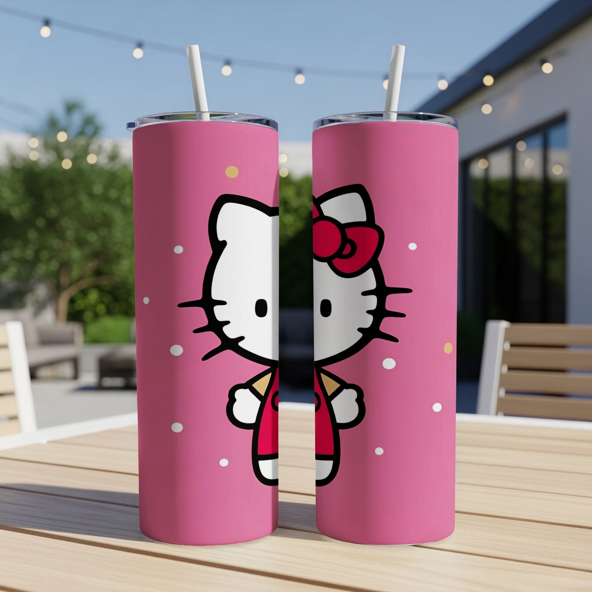Hello Kitty tumbler on a table, pink background with confetti.