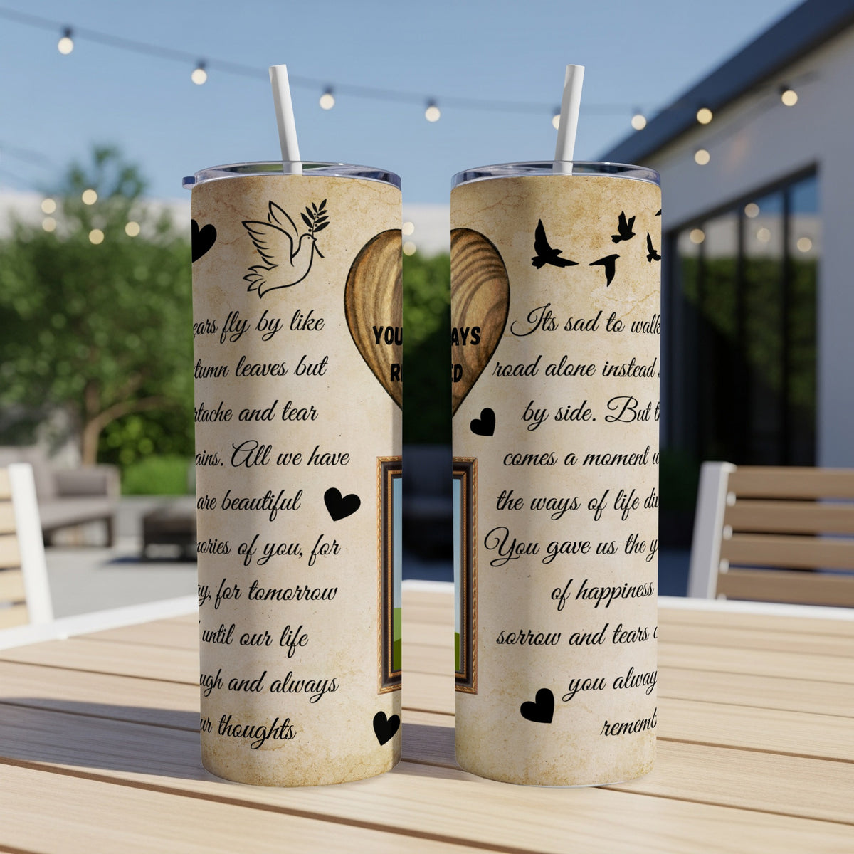 Two tumblers with a heart, dove, and birds on a parchment-like design.
