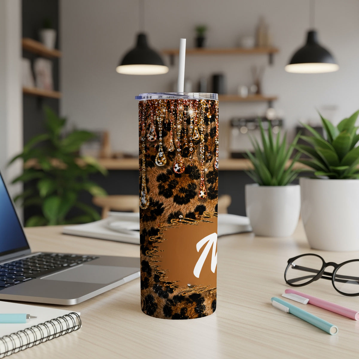 Leopard print tumbler with dripping rhinestones and the word "Mama".