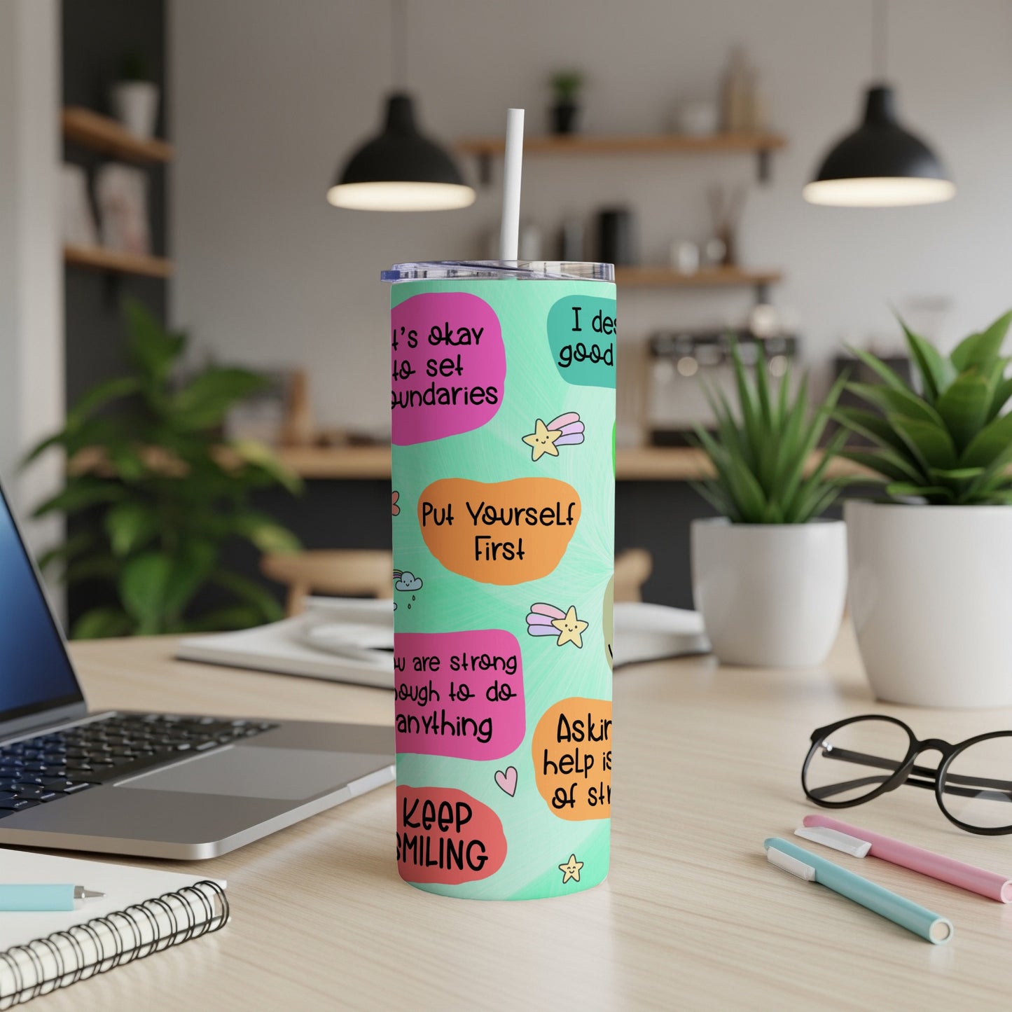 Mint green tumbler with inspirational quotes and stars.