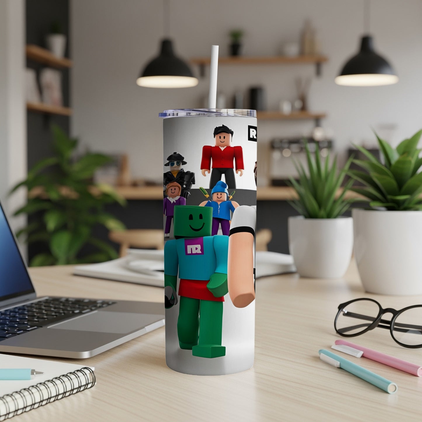 Roblox characters on a white tumbler with a straw.
