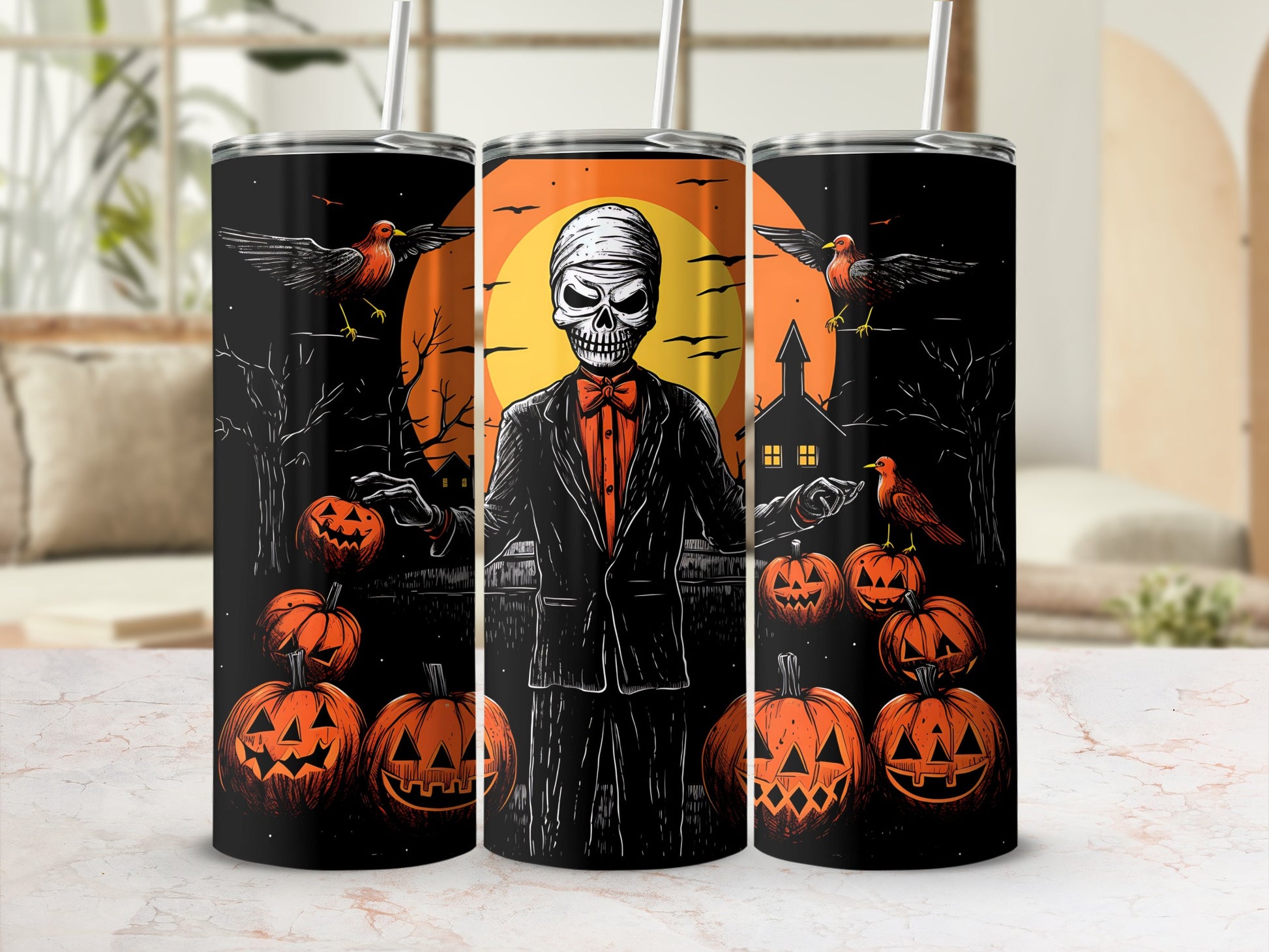Halloween tumblers with a mummy figure, jack-o'-lanterns, birds, and spooky scene.