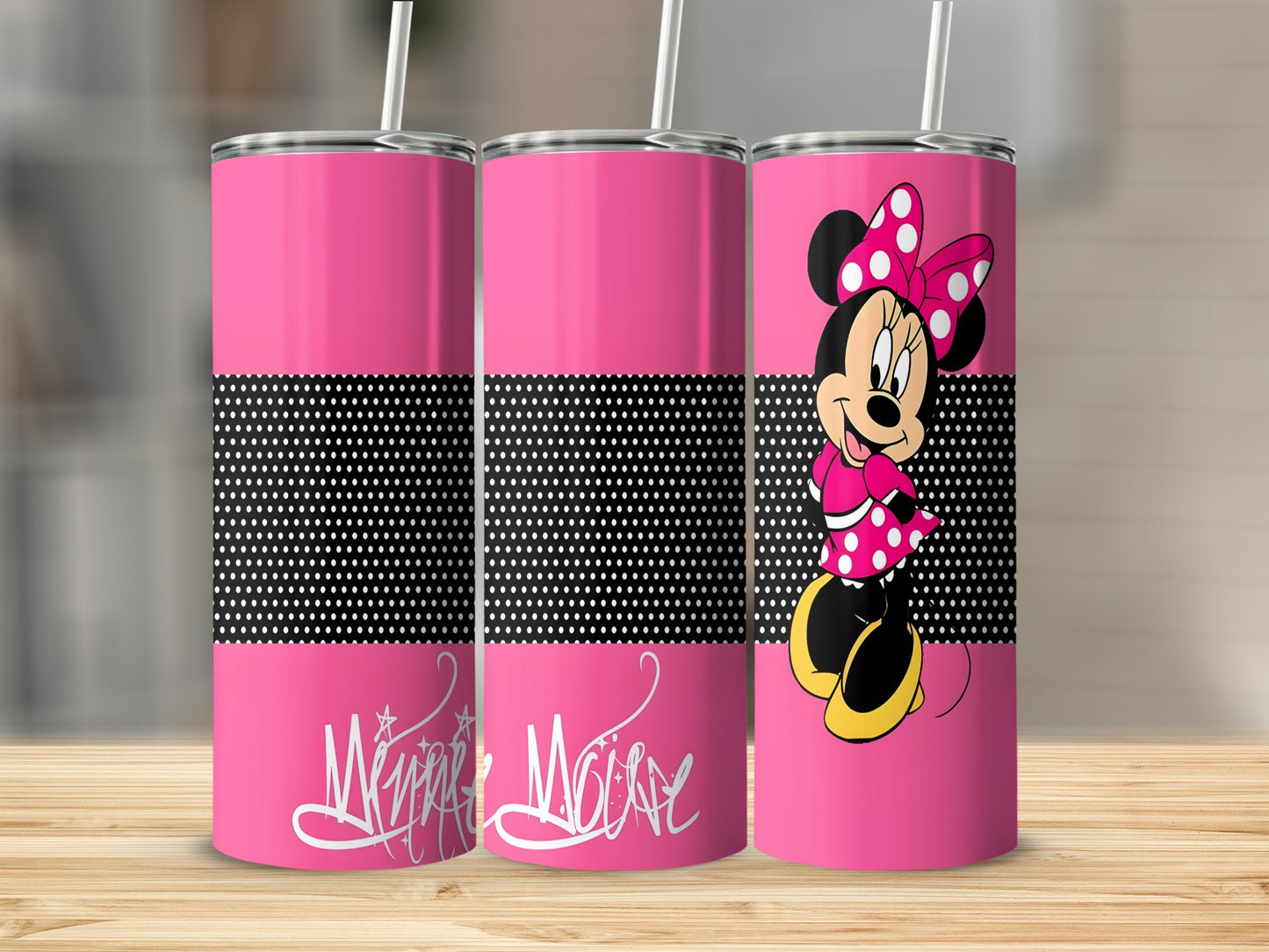 Pink tumbler with Minnie Mouse character and polka dot pattern.