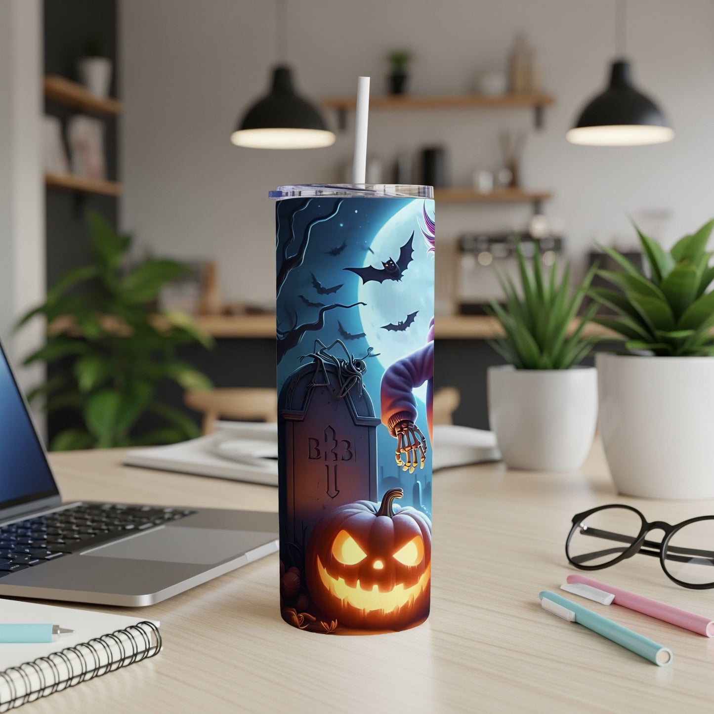 Halloween tumbler with a graveyard scene, jack-o'-lantern, and bats under a full moon.