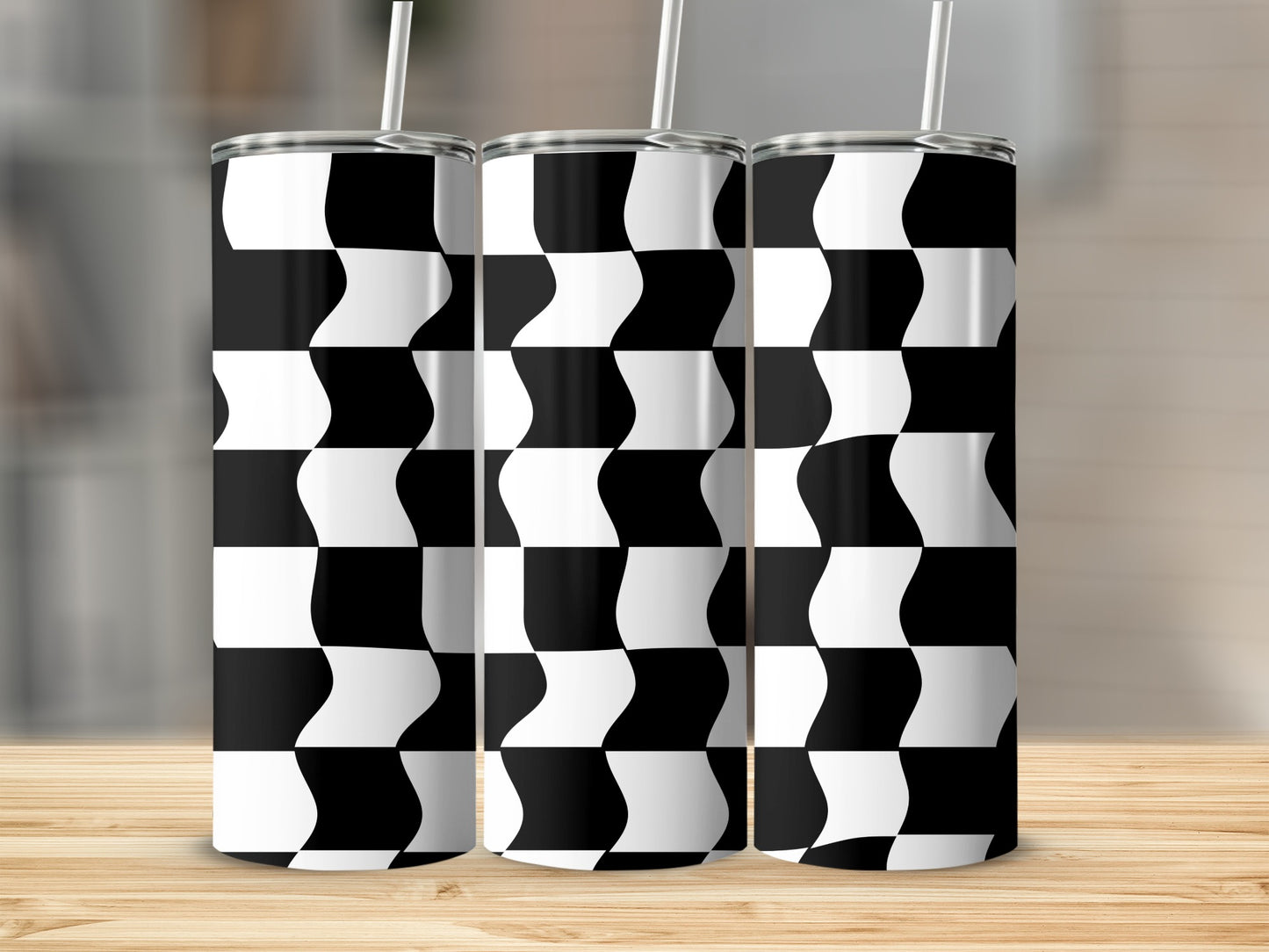 Three tumblers with a distorted black and white checkered pattern.