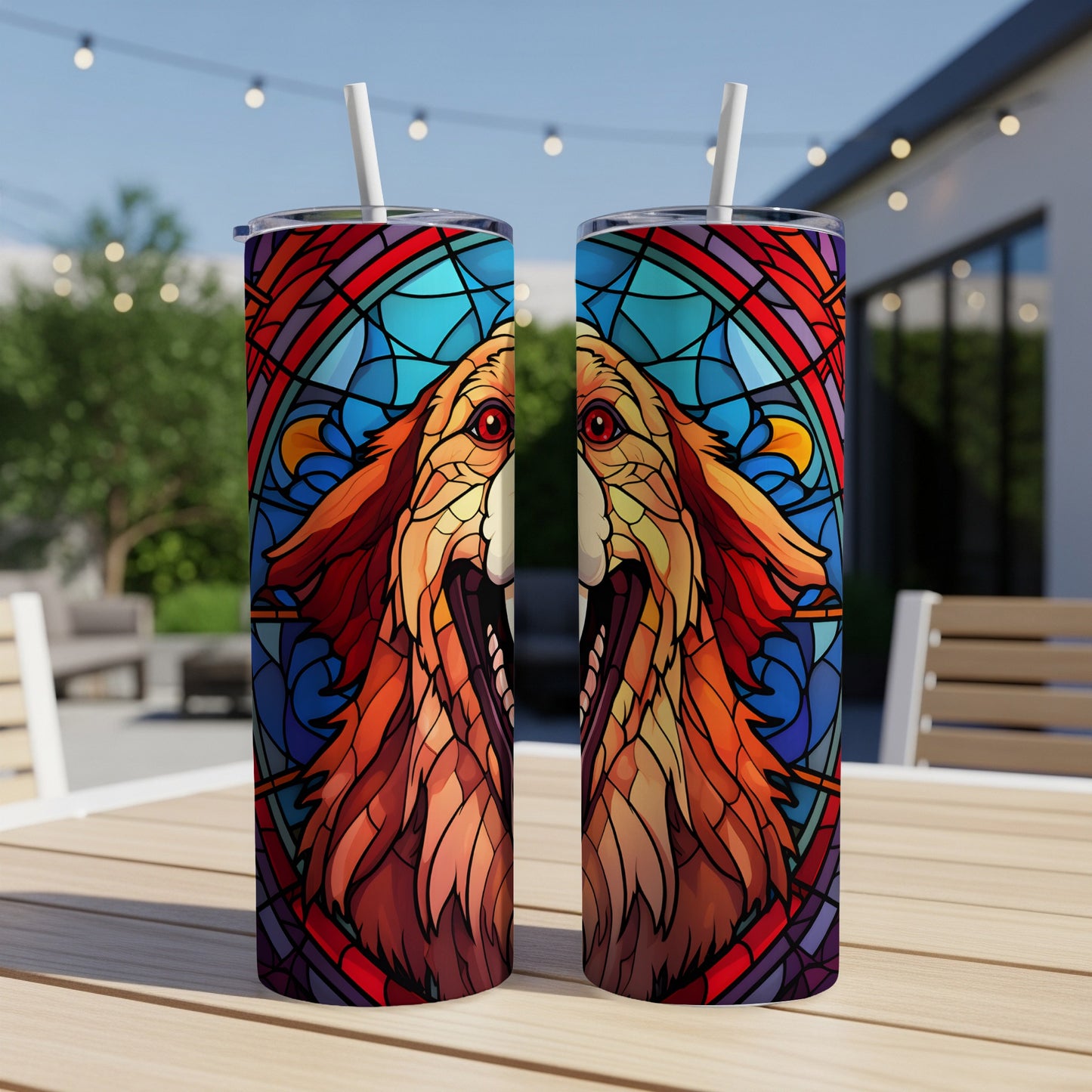 Two tumblers with a stained-glass style wolf design and straws.