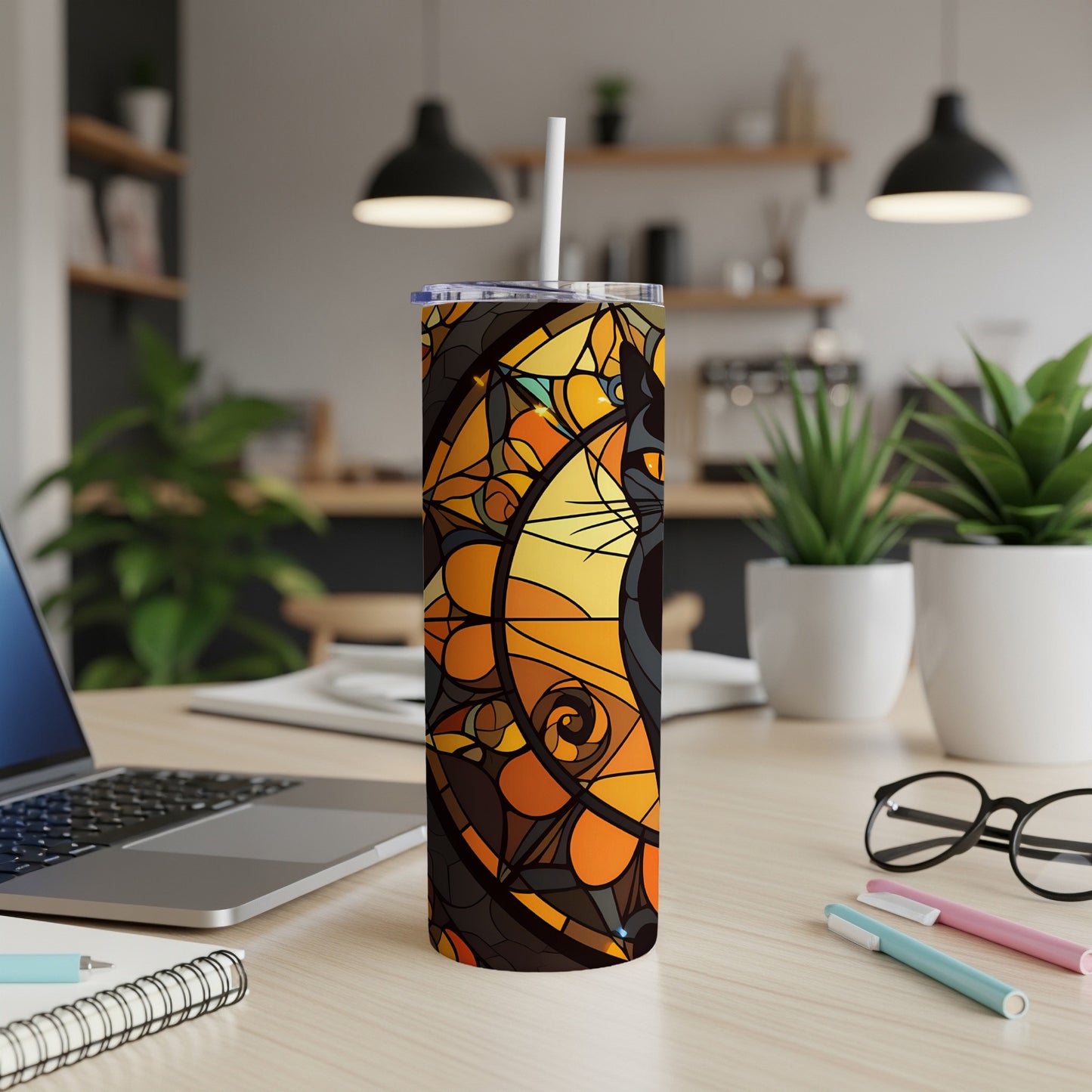 Black cat stained glass design on a white stainless steel tumbler with a straw.