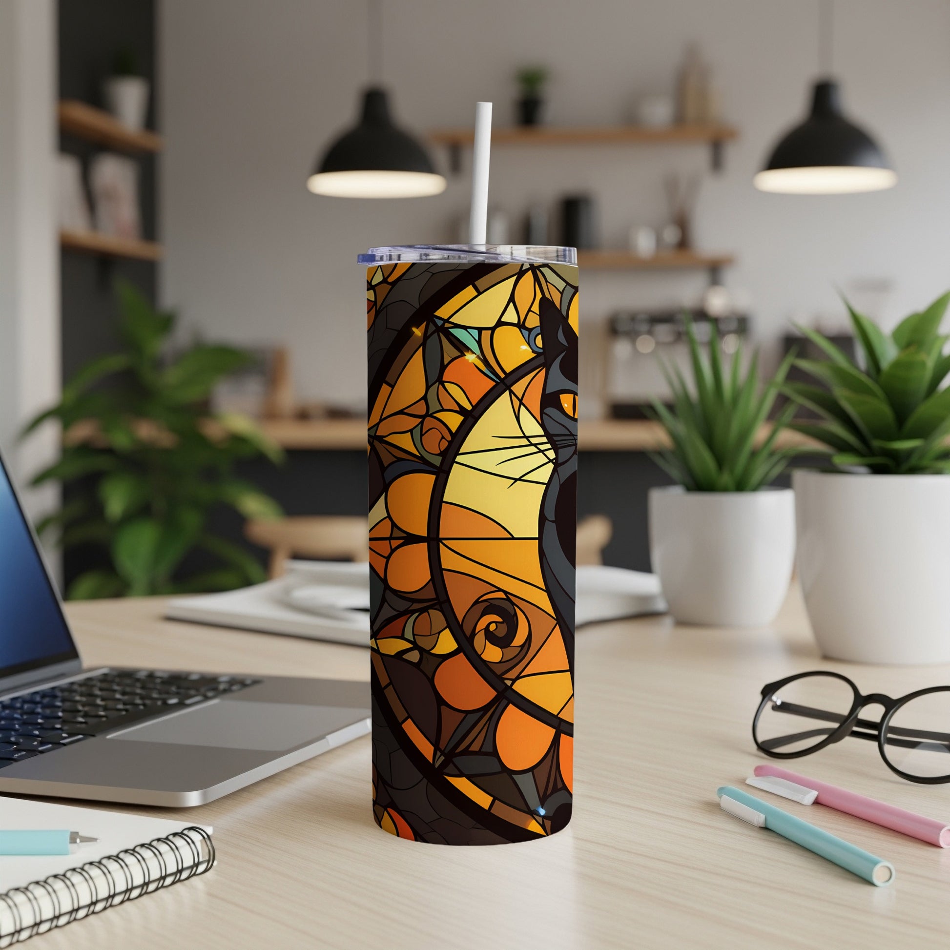 Black cat stained glass design on a white stainless steel tumbler with a straw.