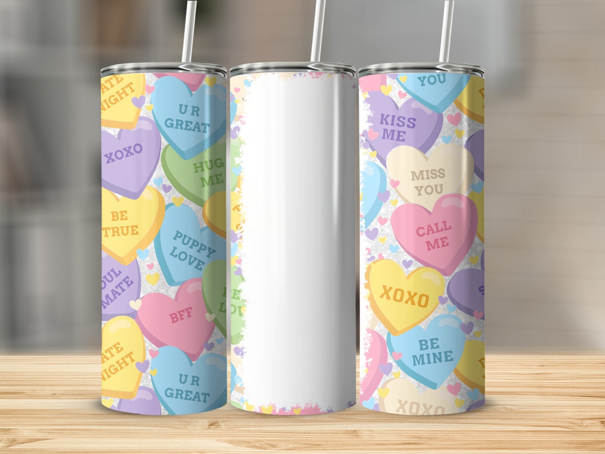Tumbler with conversation heart designs and Valentine's Day phrases.