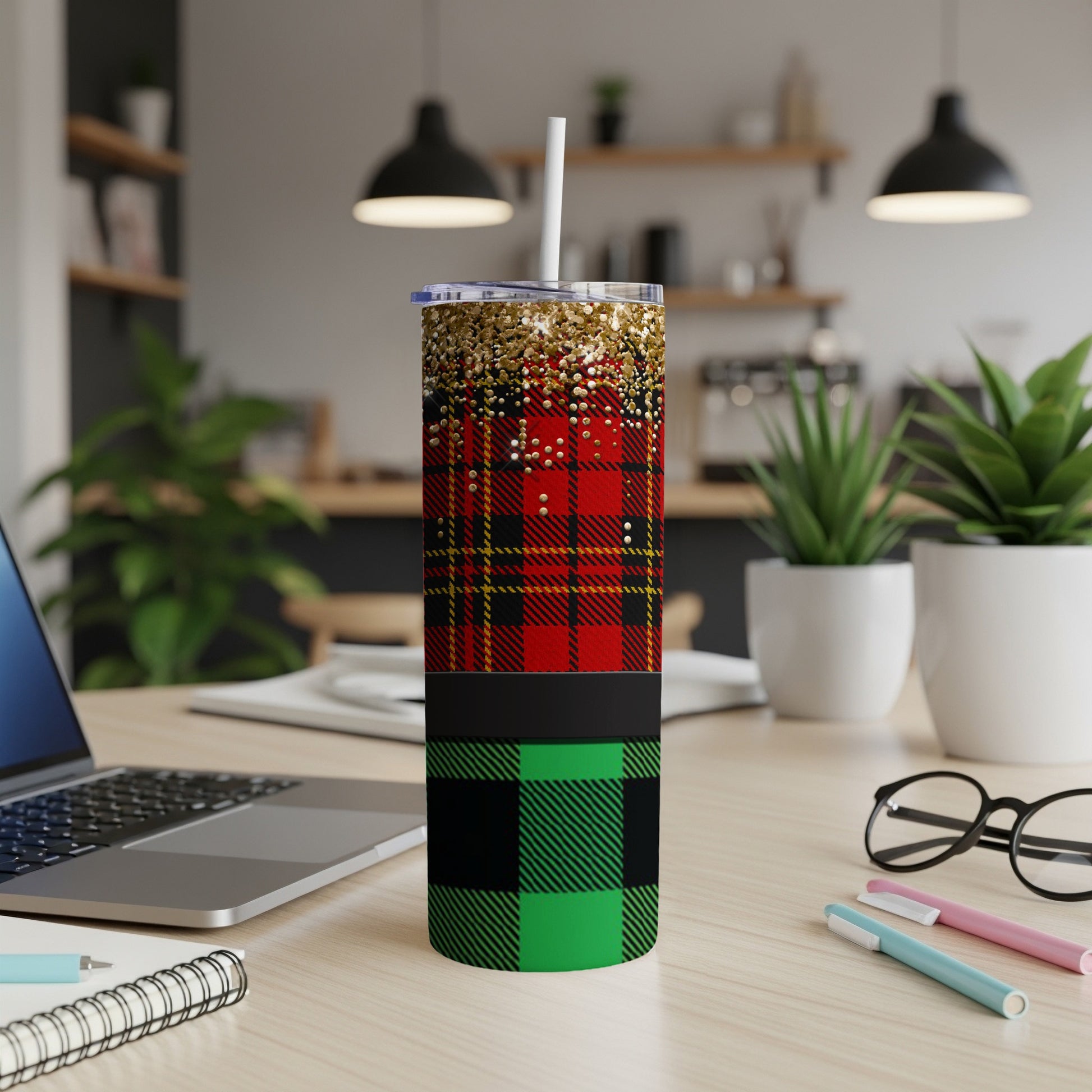 Red, green, and gold plaid insulated tumbler with white straw.