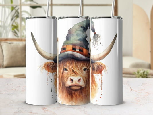 Highland cow wearing a witch hat on a white tumbler.