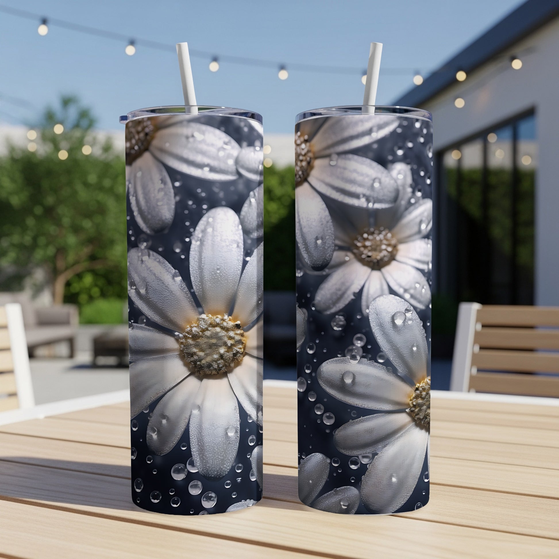 Two tumblers with white daisies and water droplets design.