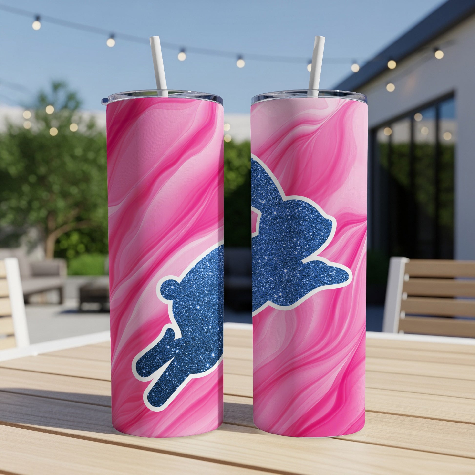 Two pink marbled tumblers with glitter blue bunny silhouettes.