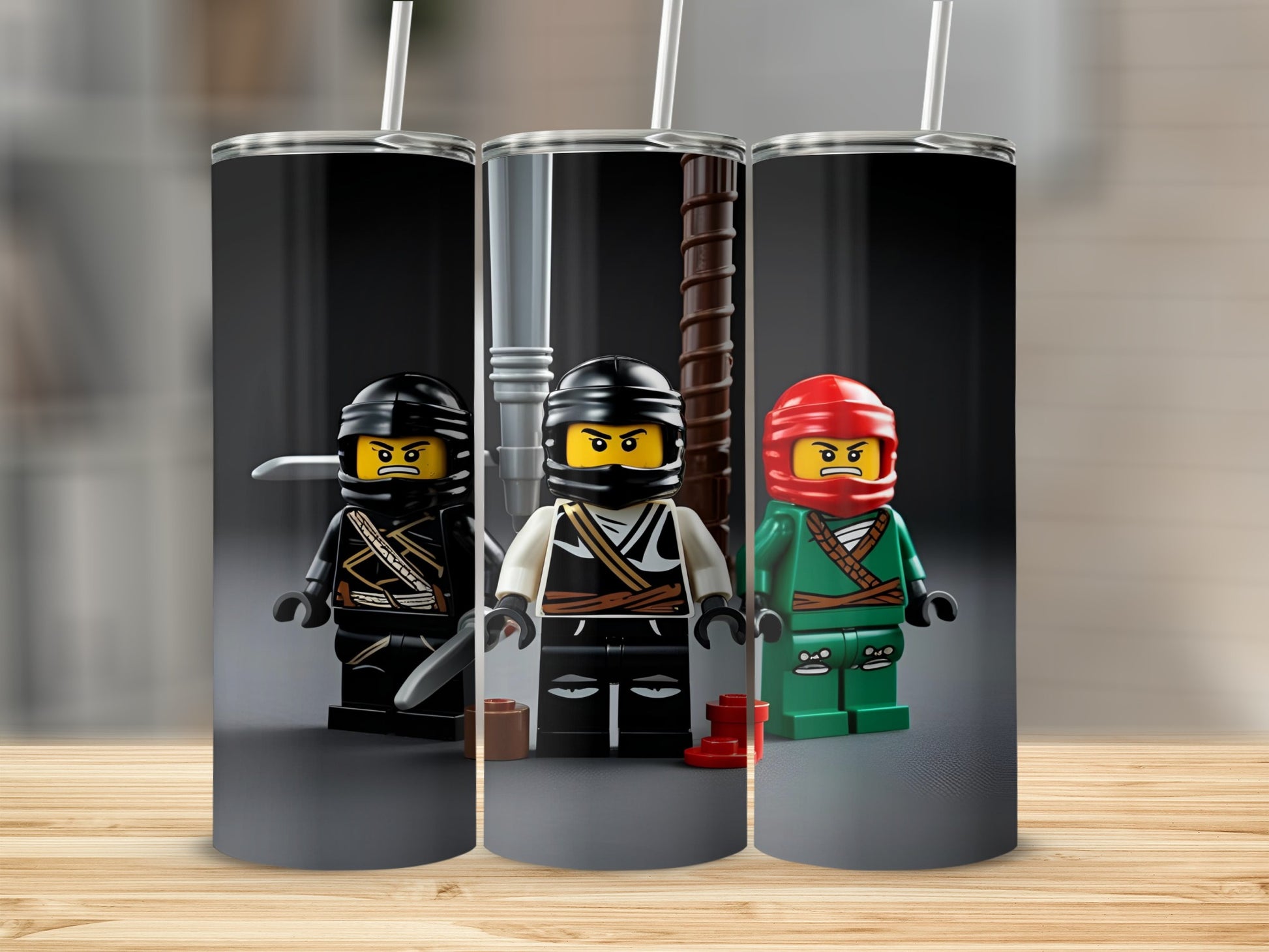 Three Lego Ninjago figures in black, white, and green outfits on a cylindrical tumbler.