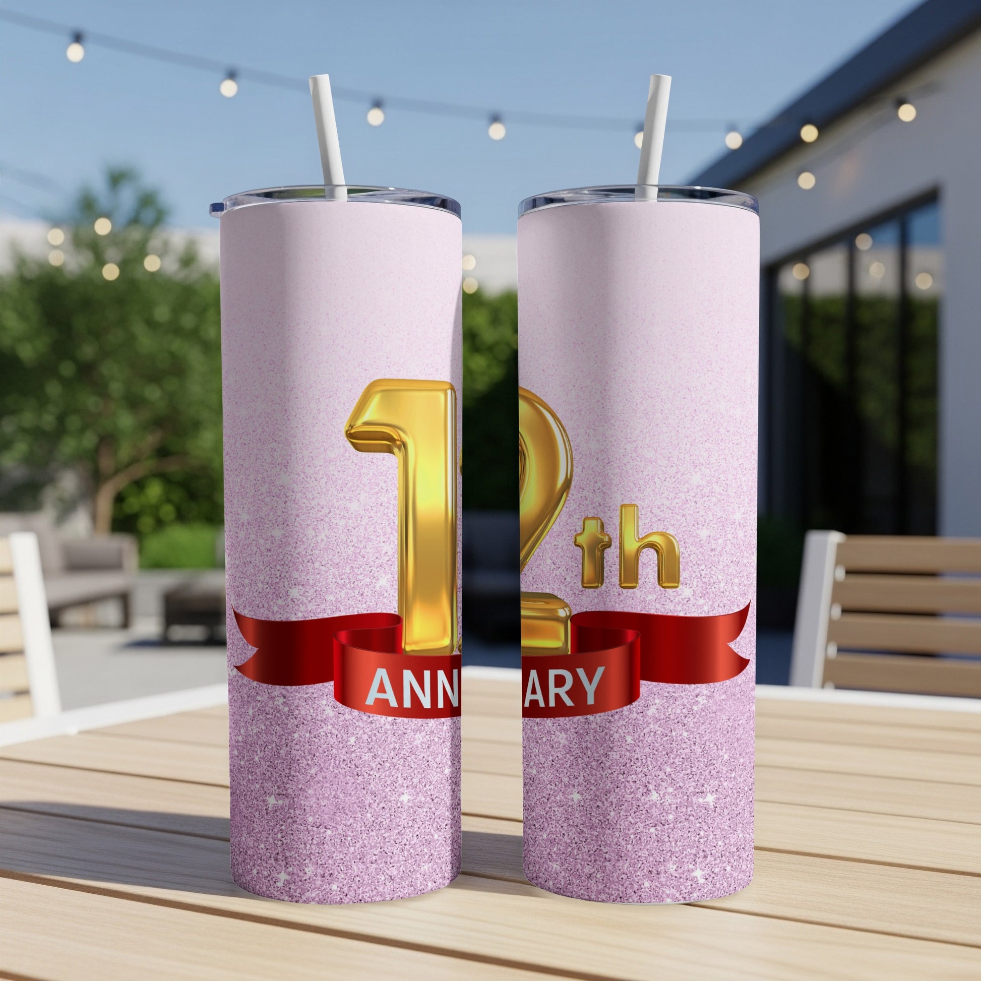Gold "12th Anniversary" text with red ribbon on a glitter tumbler.