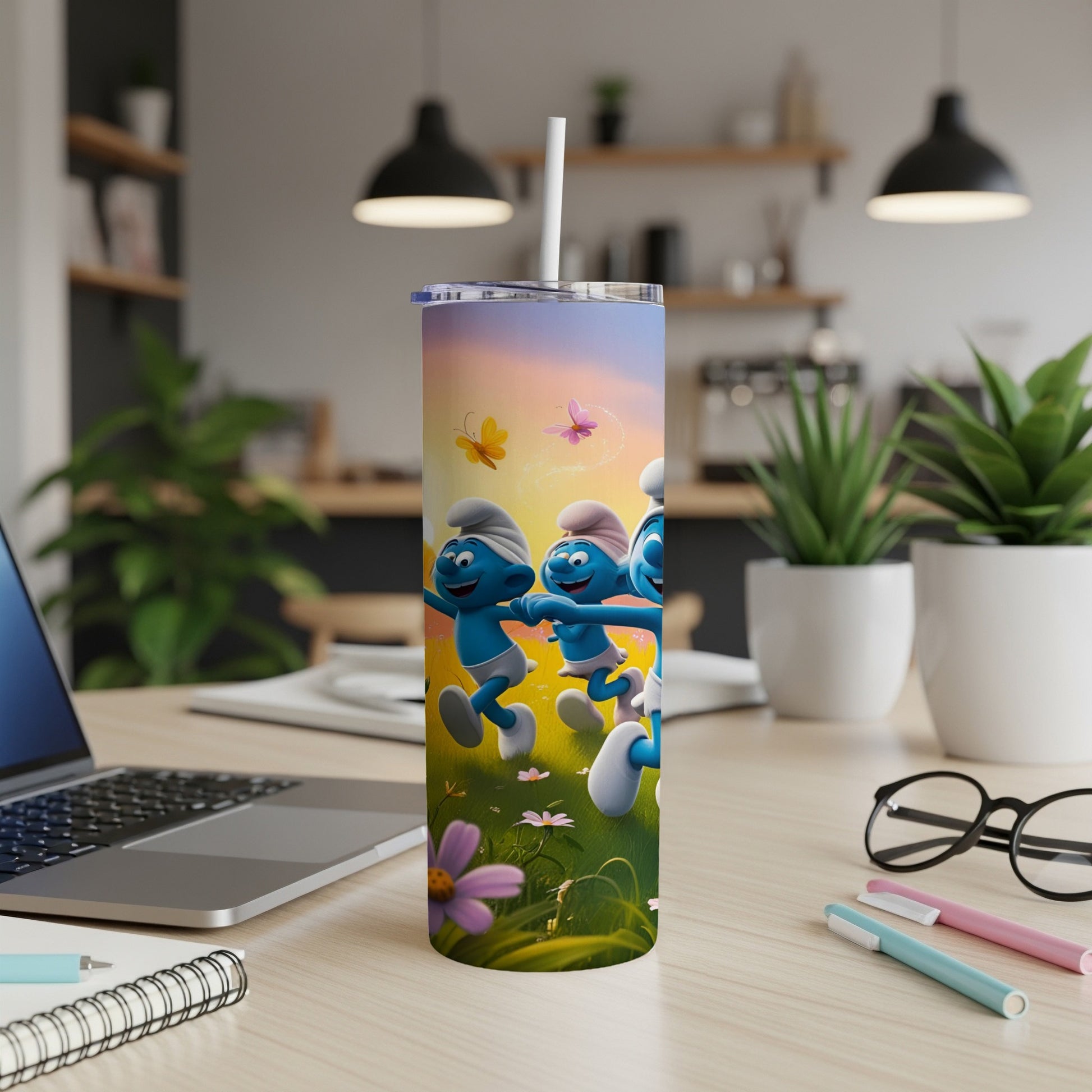Smurfs dancing with butterflies and flowers on a colorful tumbler.