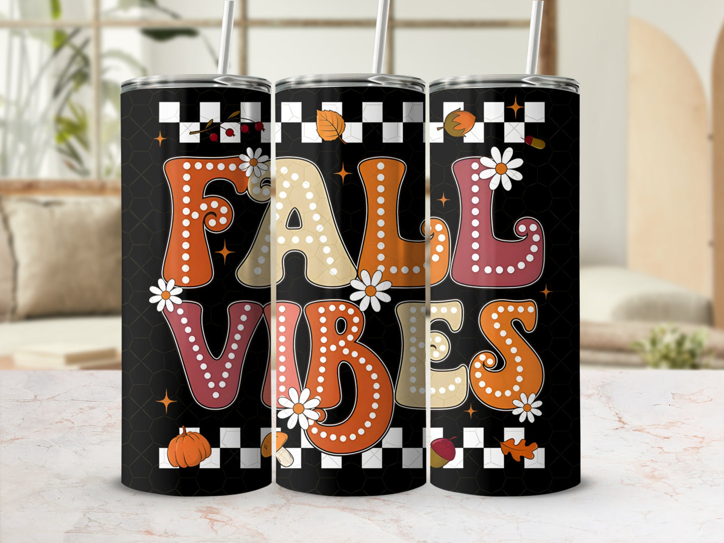 Black tumbler with "FALL VIBES" text, autumn leaves, and pumpkins.