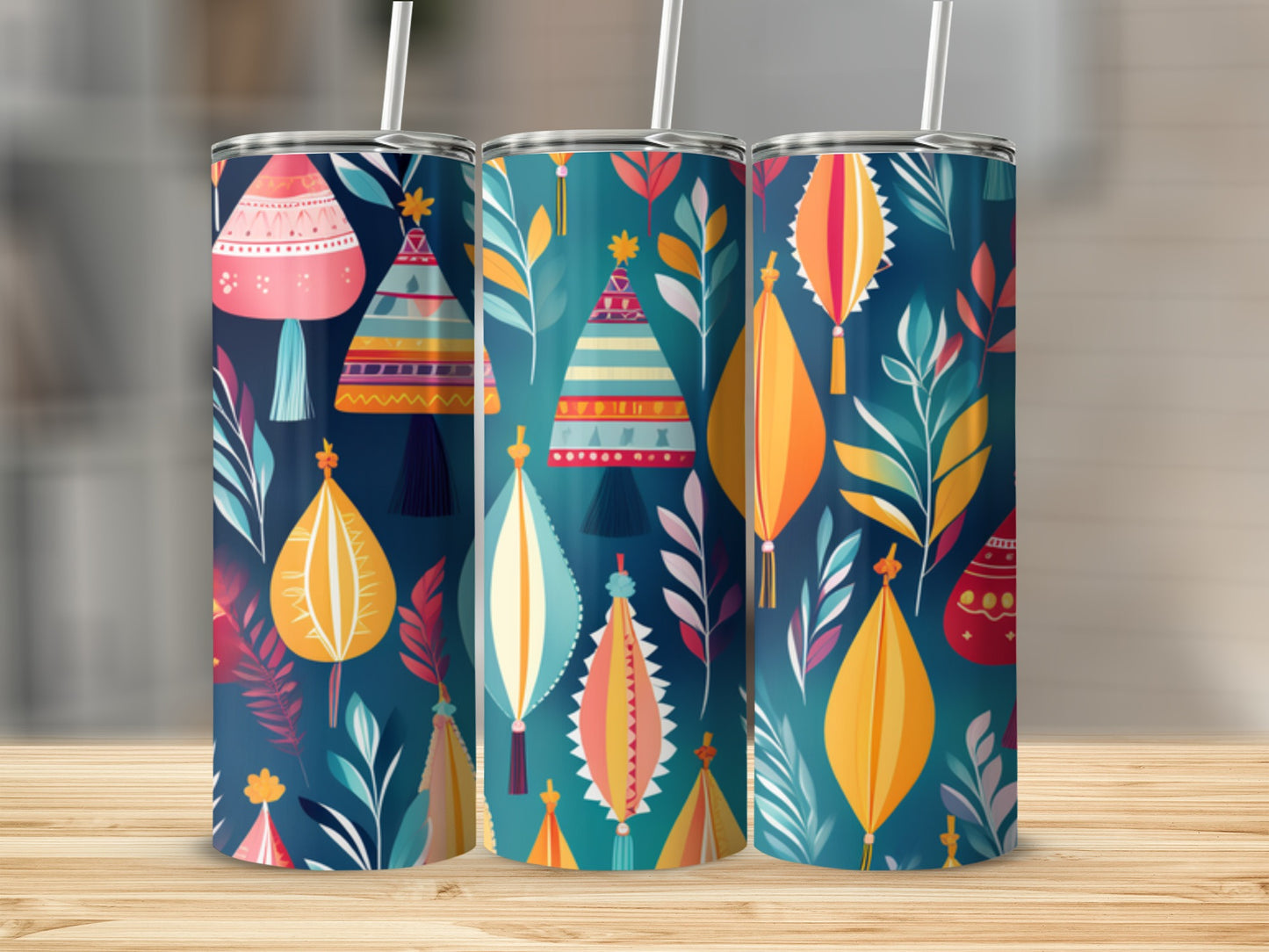 Three teal tumblers with colorful folk art floral and lantern patterns.