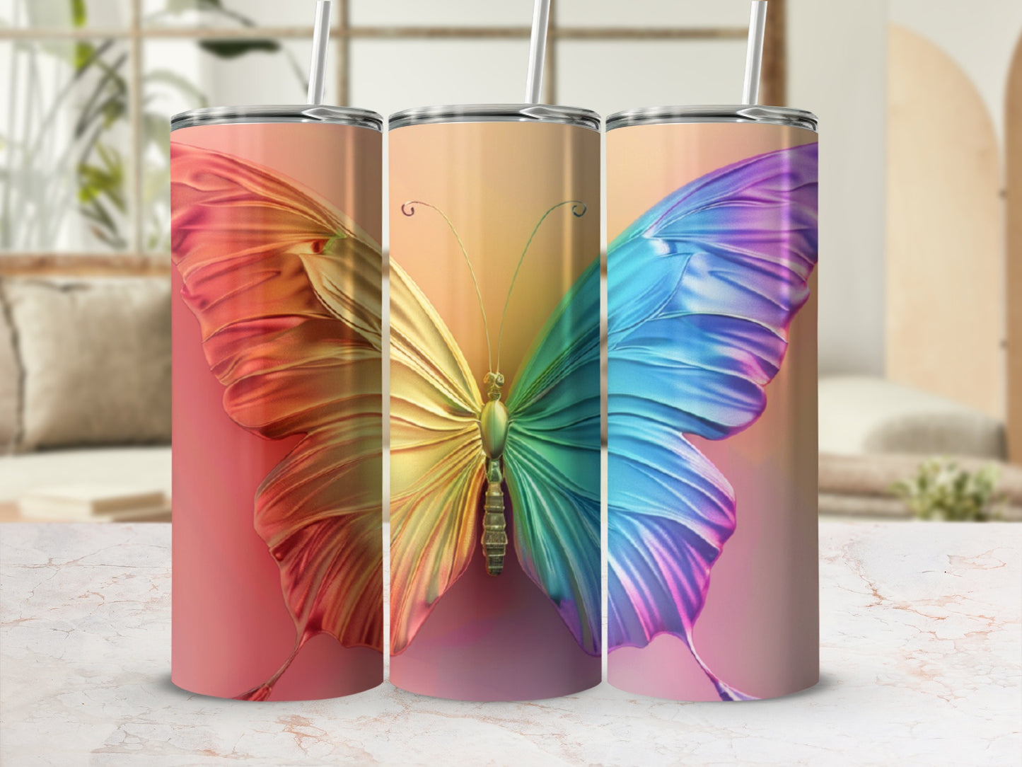 Three tumblers featuring a colorful iridescent butterfly design.