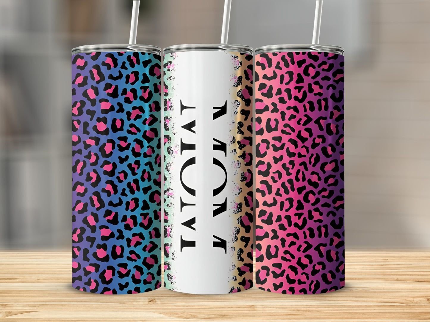 Three tumblers with leopard print and "MOM" text.