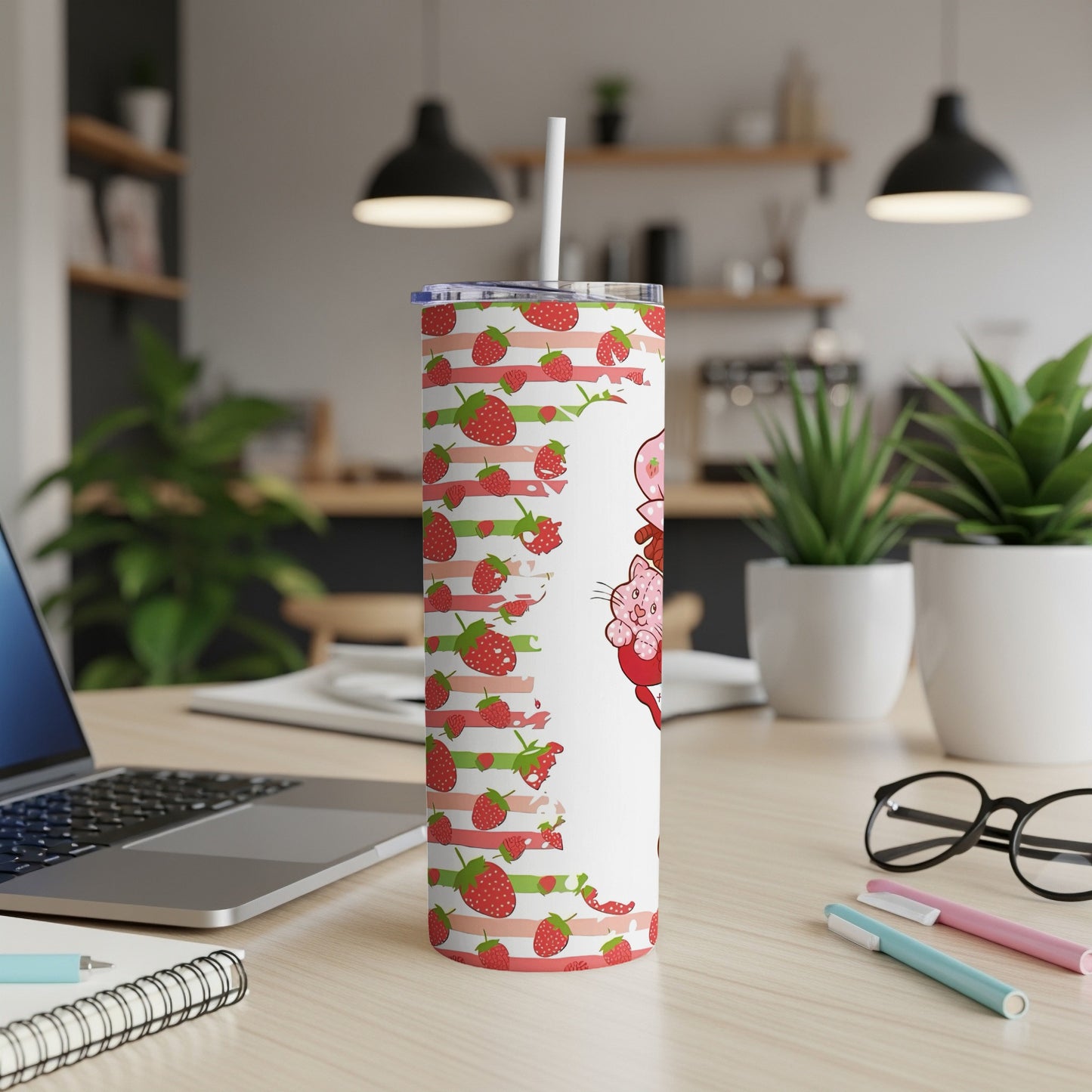 Strawberry patterned tumbler with a cat wearing a strawberry hat.