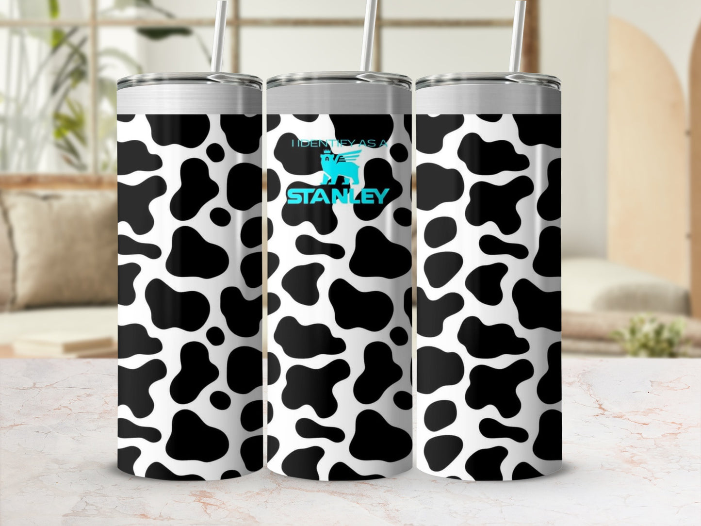 Identifies as the Stanley Cow Print Tumbler Product