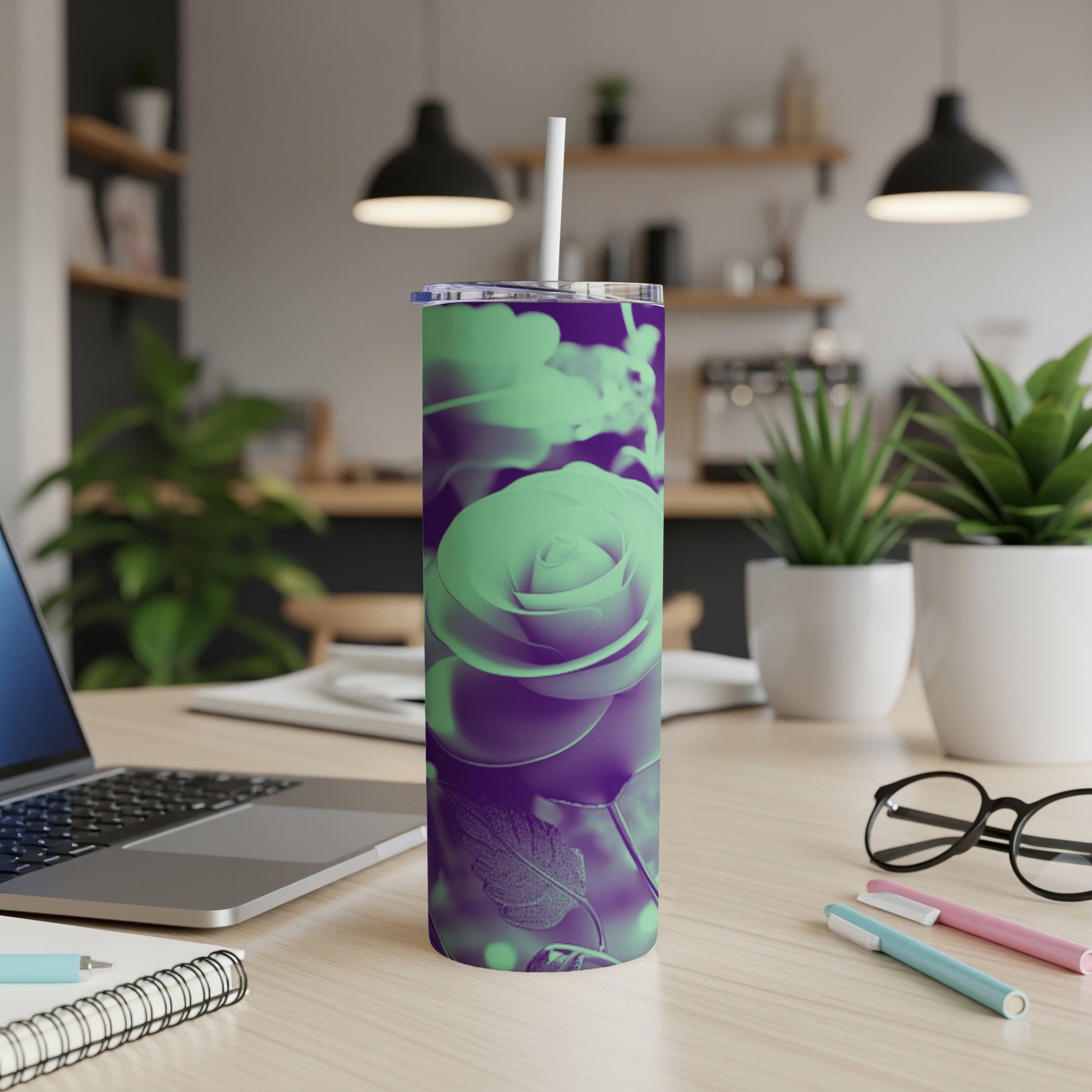 Purple and green rose design on a stainless steel tumbler with straw.
